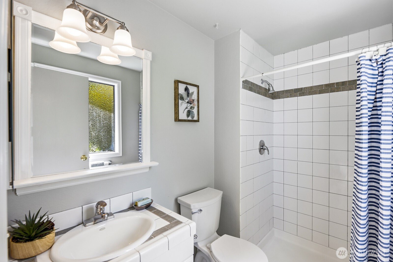 The 3/4 bath off the primary bedroom.