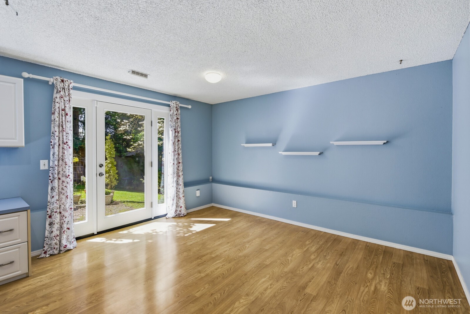 The family room on the lower level walks out to the rear yard.