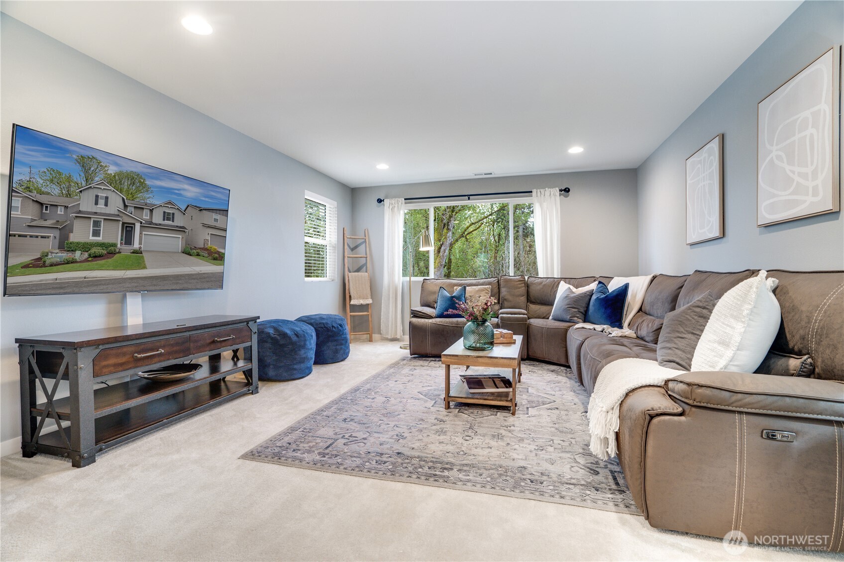 Bonus room is spacious, well lit and overlooks the green space and mature trees in the backyard.