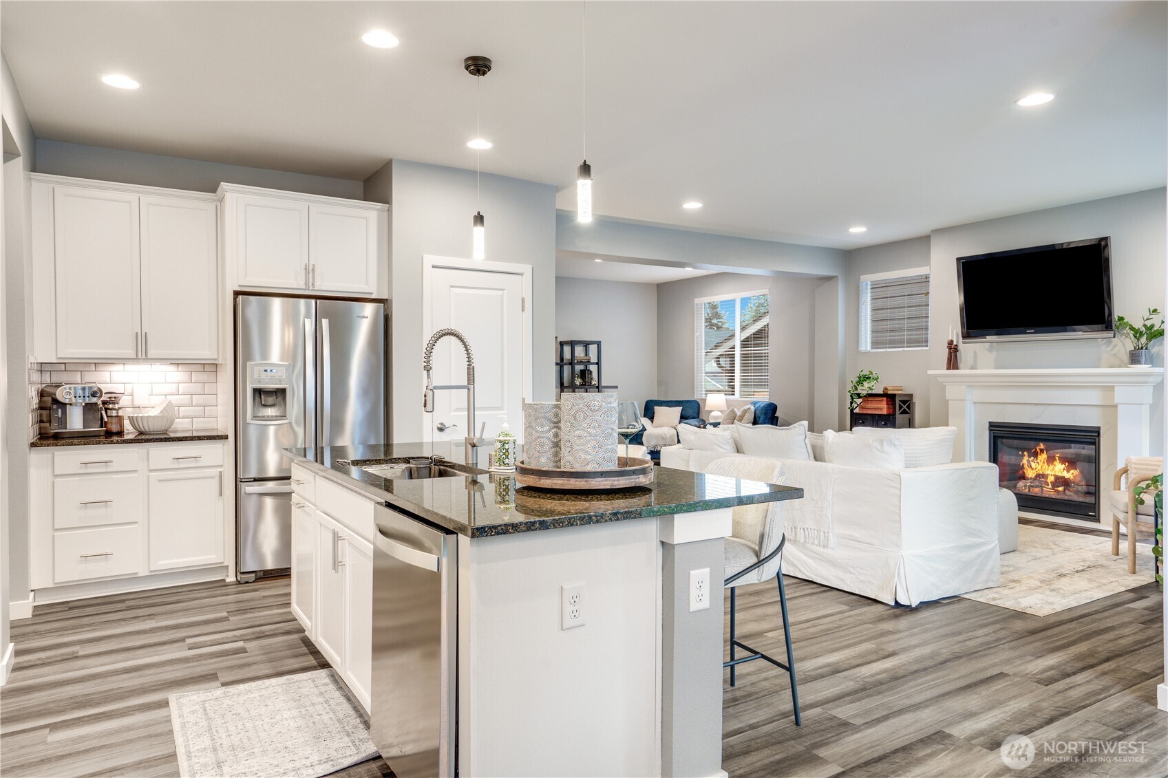 Large island. To the left of the fridge is an ideal location for your coffee and/or wine bar. To the right of the fridge, additional closet storage. This house has an incredible amount of storage.
