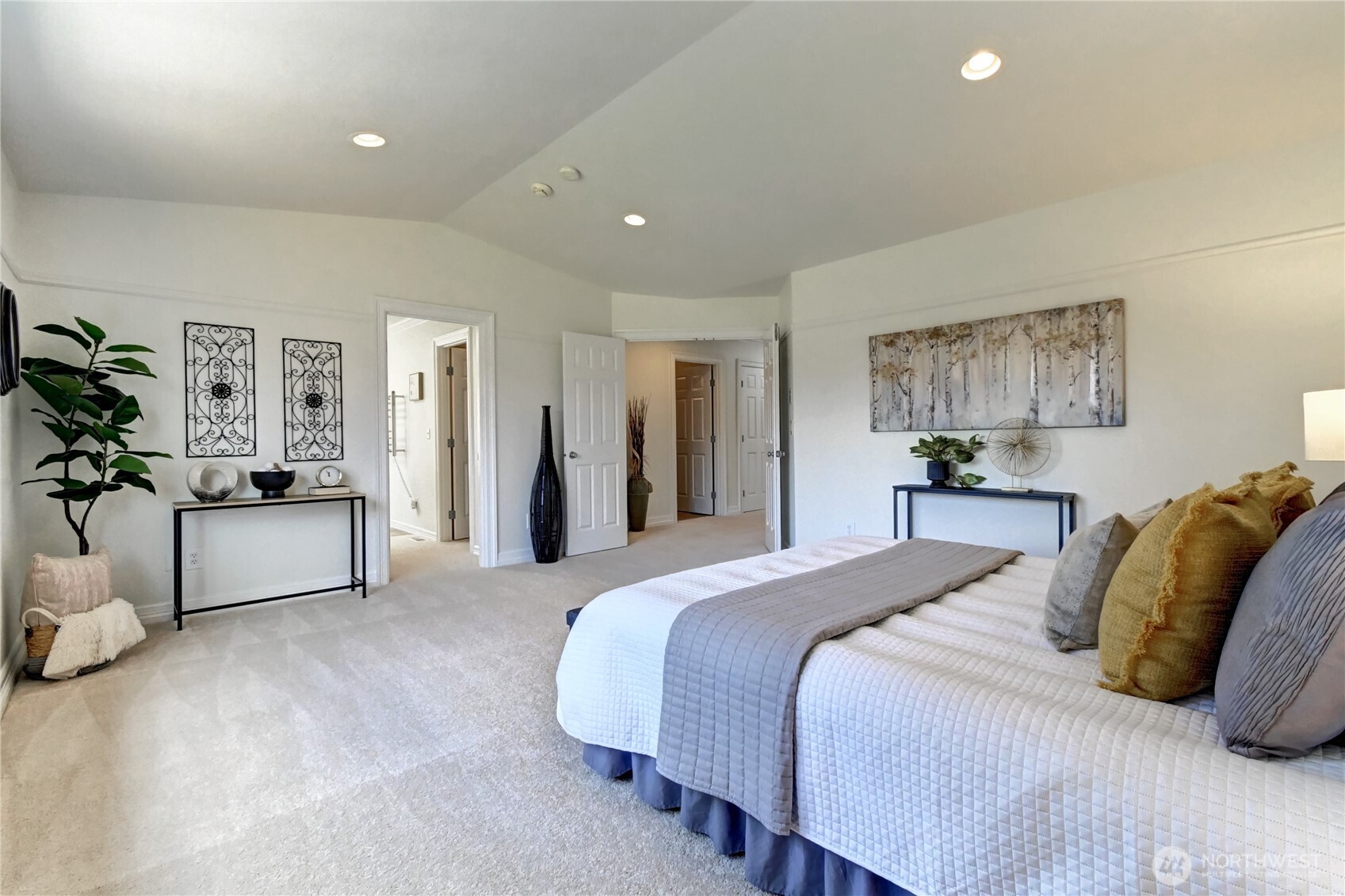 Spacious Primary Suite w/ 5 piece master bath and dual walk-in closets.