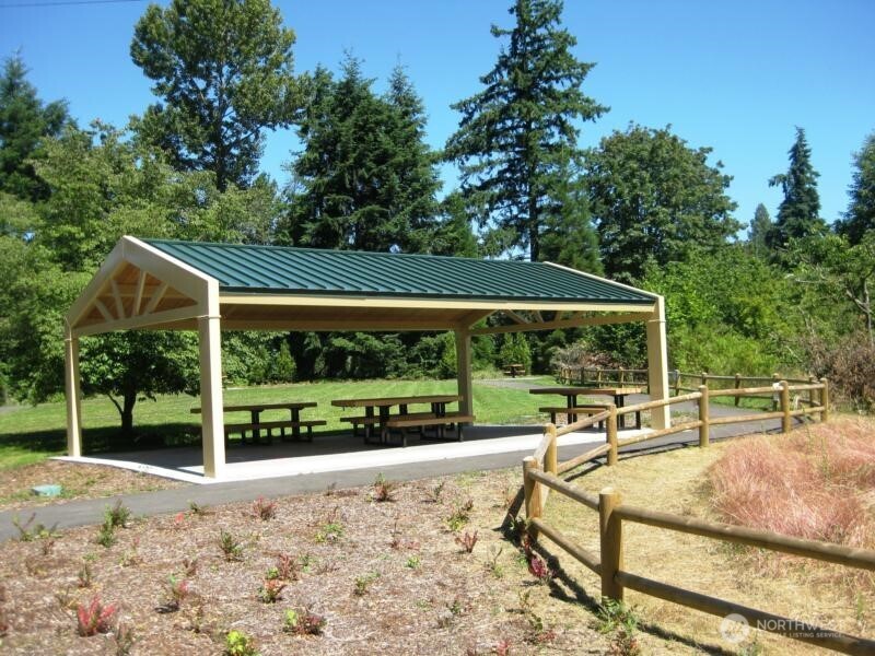 Rose Hill Meadows Park is a 4 Acre dog-friendly Community Park located adjacent to this home w/ playground, picnic shelter, community garden & walking trails.