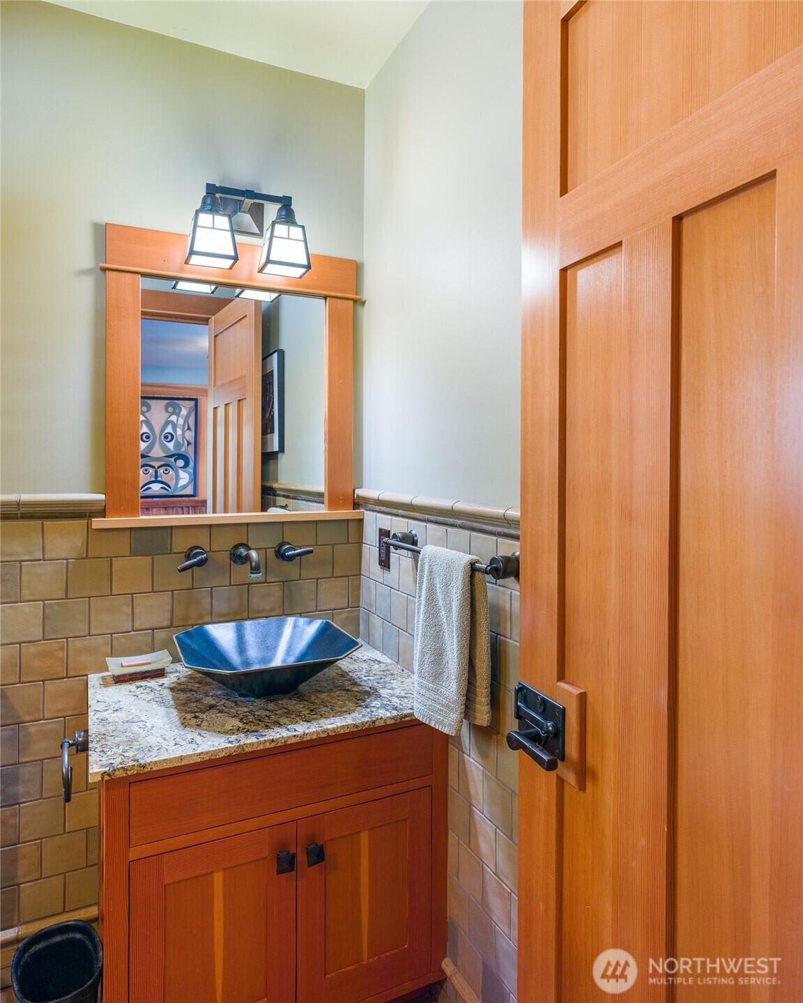 Powder room just off the entry.
