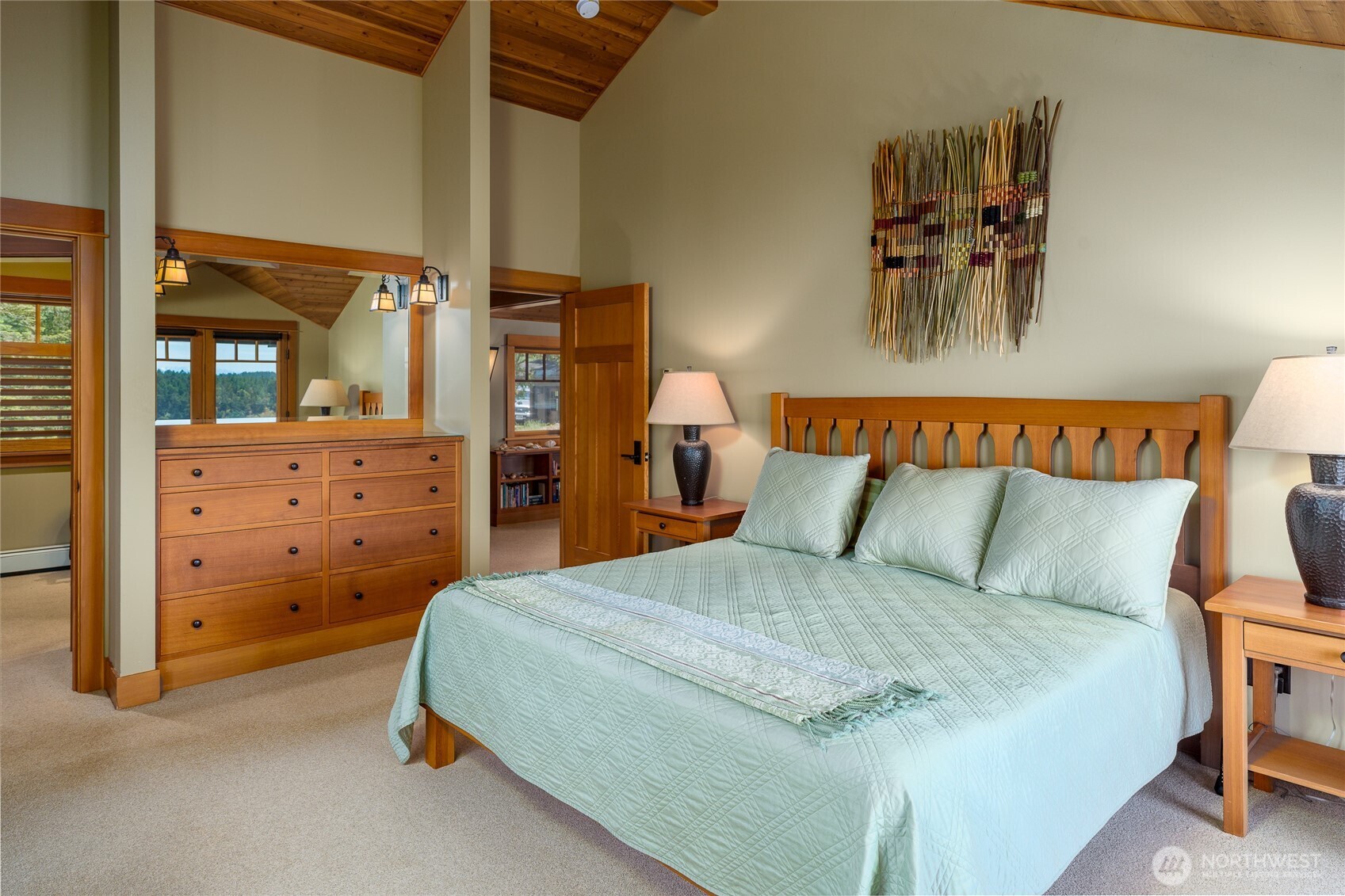 Second primary bedroom has built-in dresser.
