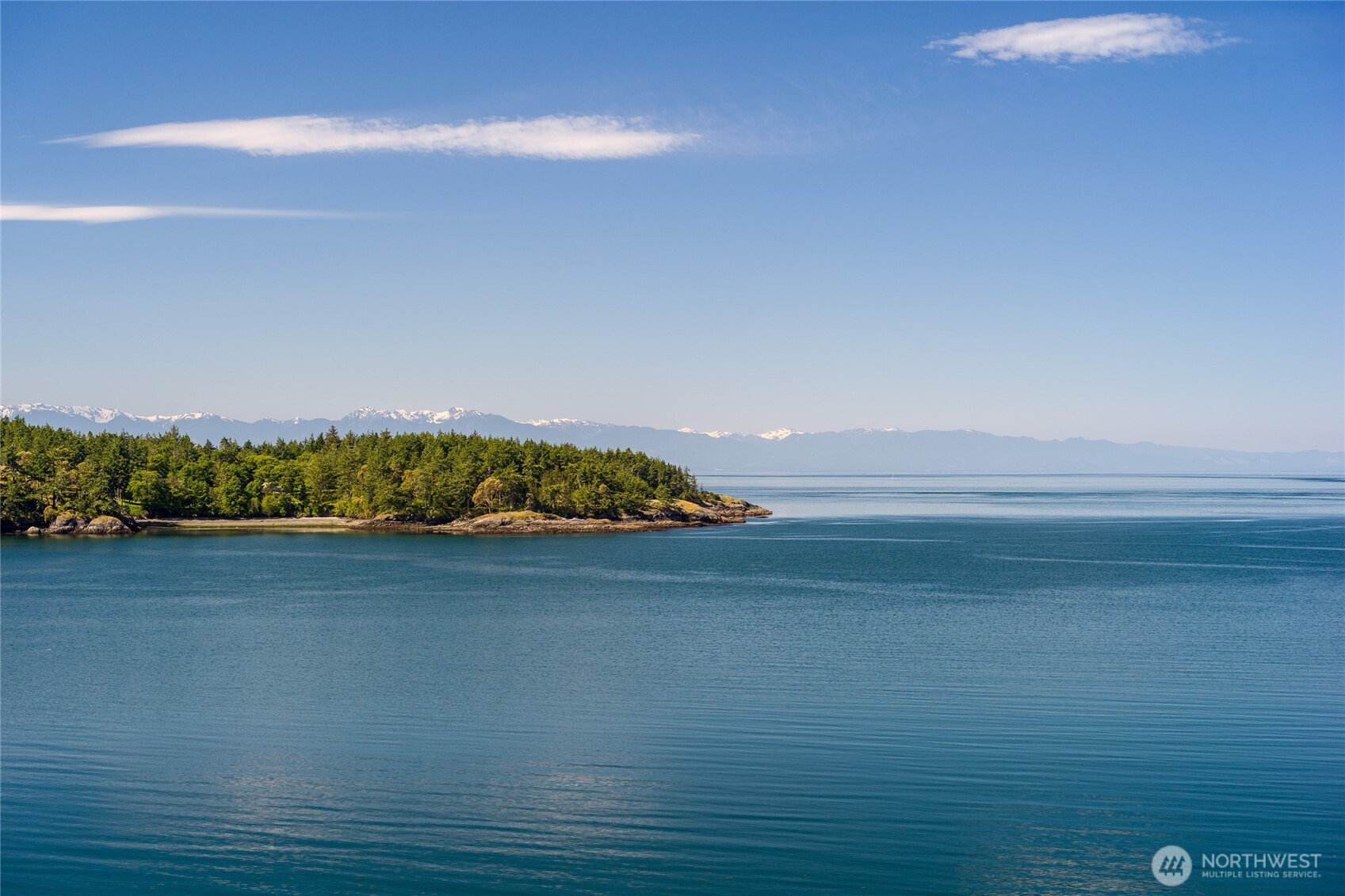 Breathtaking views from most rooms of this custom NW Craftsman.