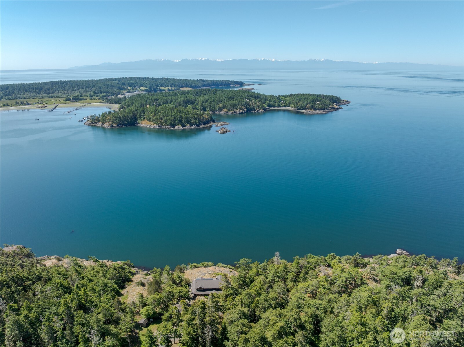 Looking south over the house at MacKaye Harbor and out to the Straits.