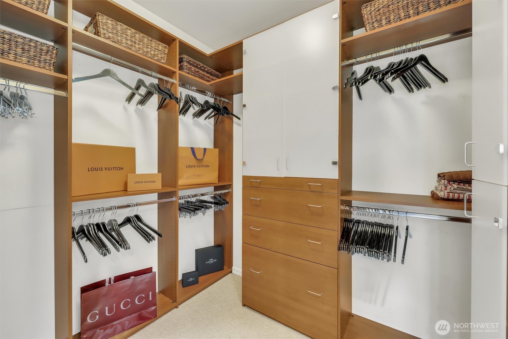 Custom built-ins in the master closet make getting organized easy