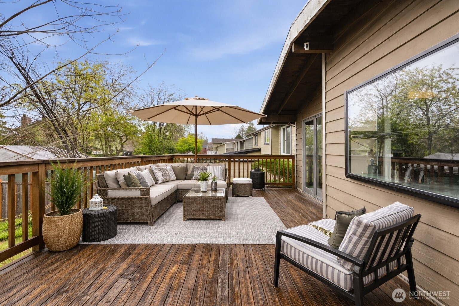 Primary ensuite vanity area featuring generous storage and counter space.