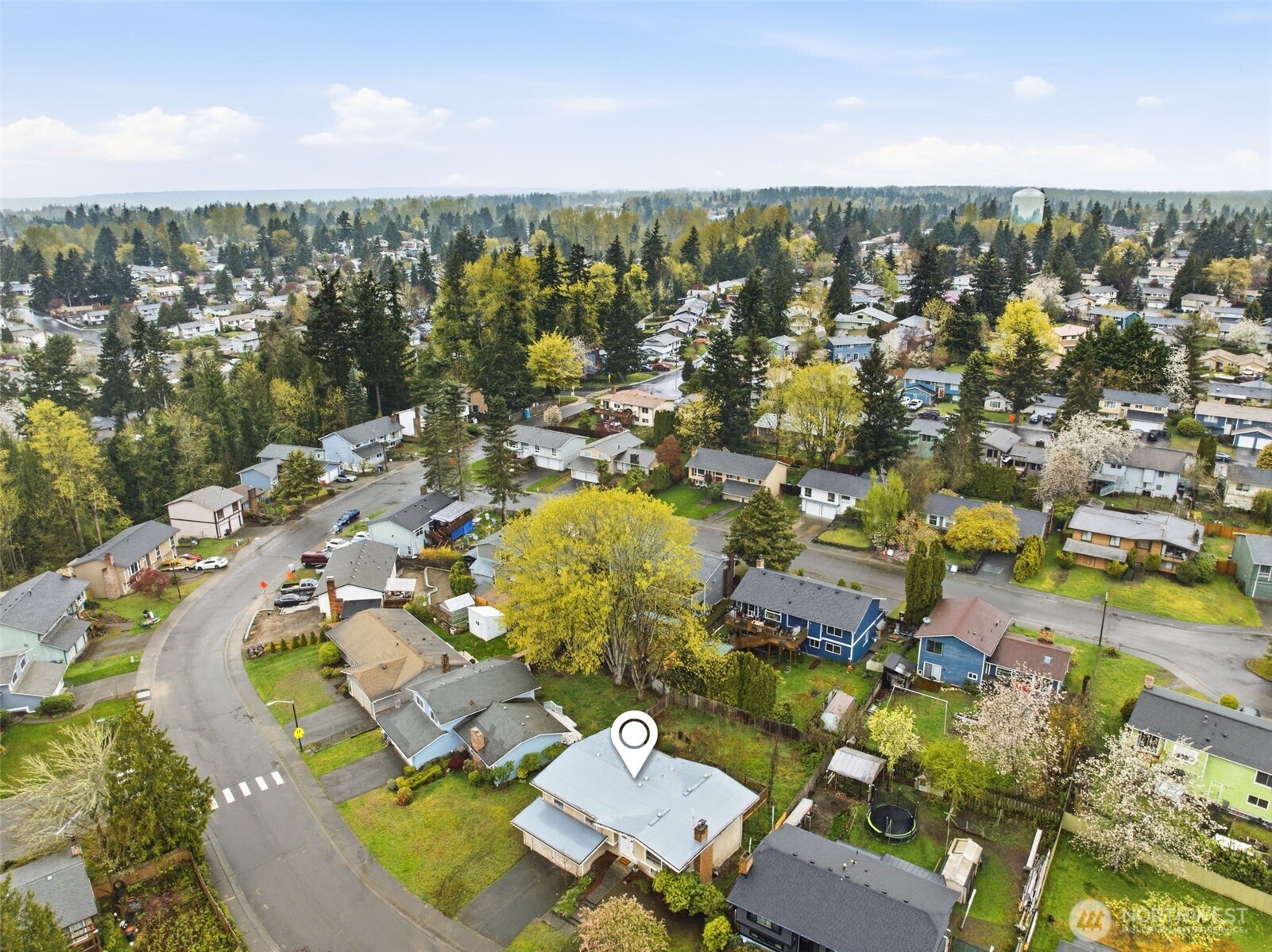 Spacious 2-car garage (approx. 490 sq ft) featuring ample shelving and storage.