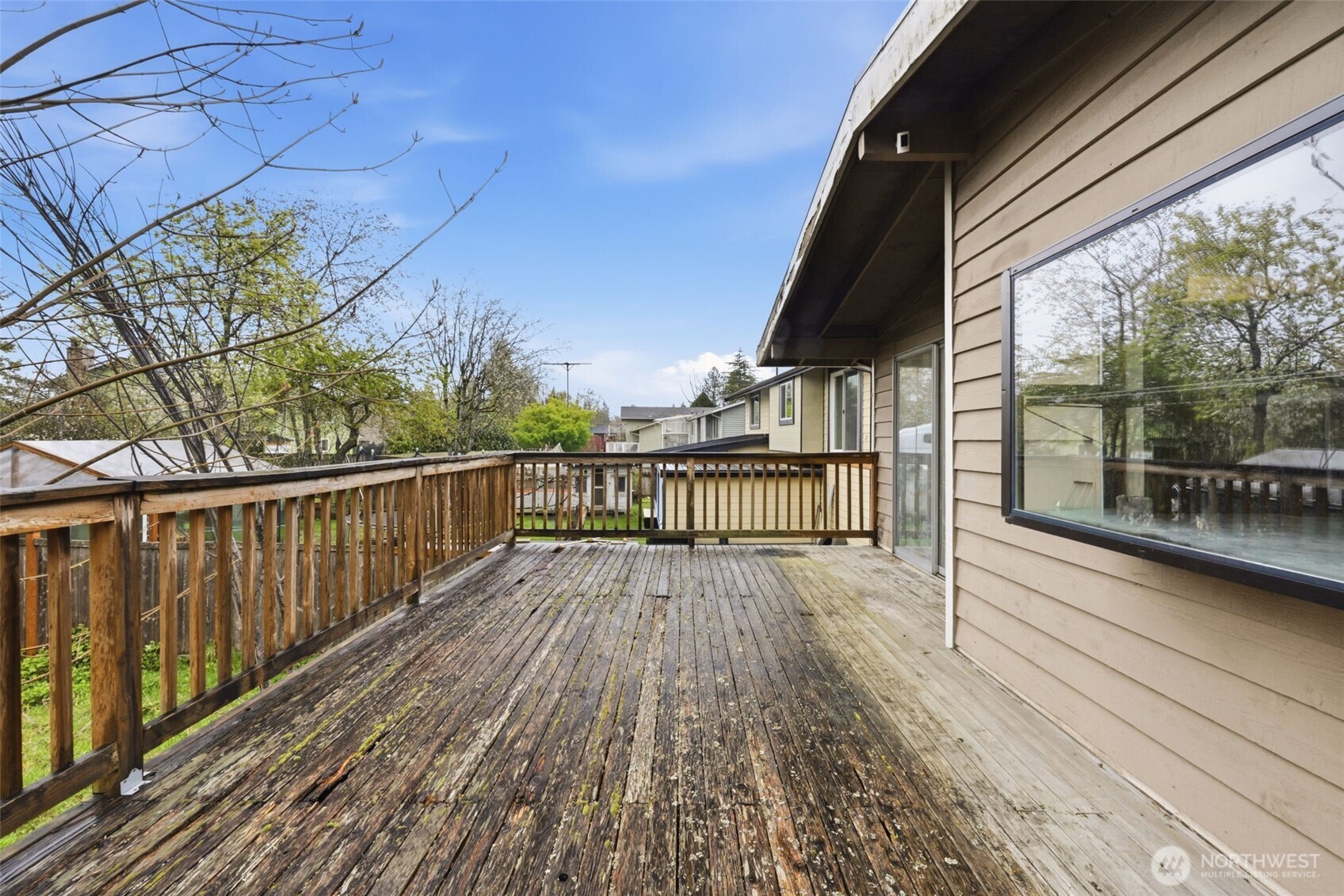 Large deck off the dining area—ready to be restored to your personal style.