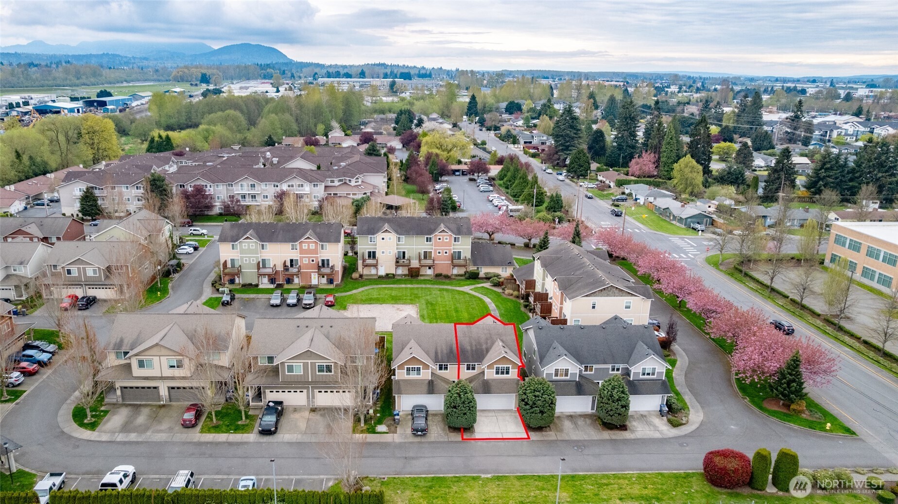 Condo is outlined in RED