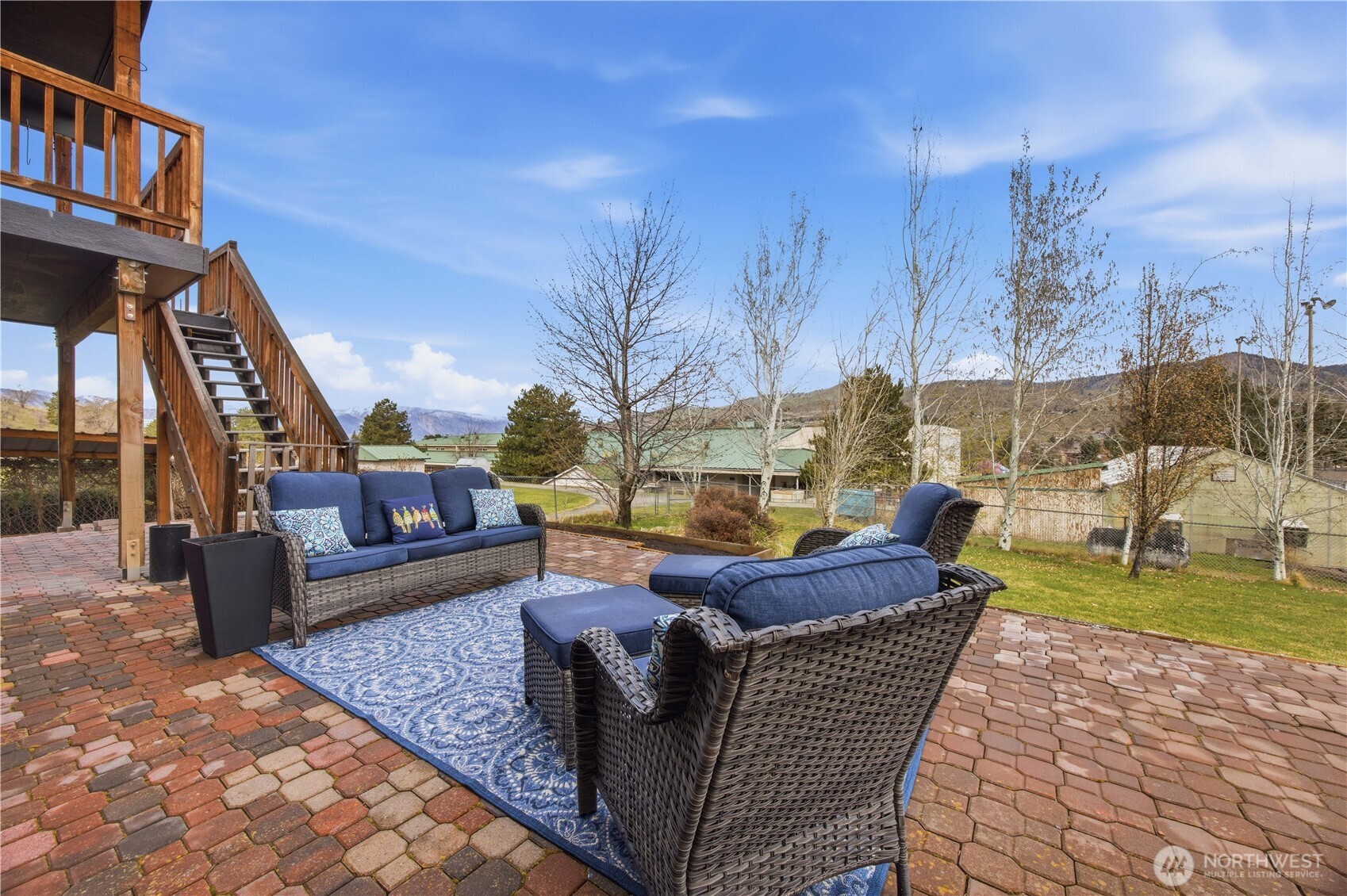 Downstairs great room and bar with slider to patio.
