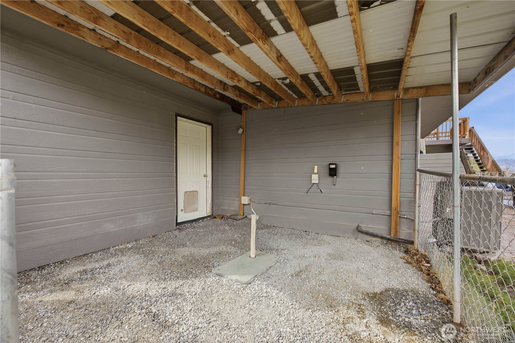 Downstairs bonus room/bedroom with closet and slider to patio.