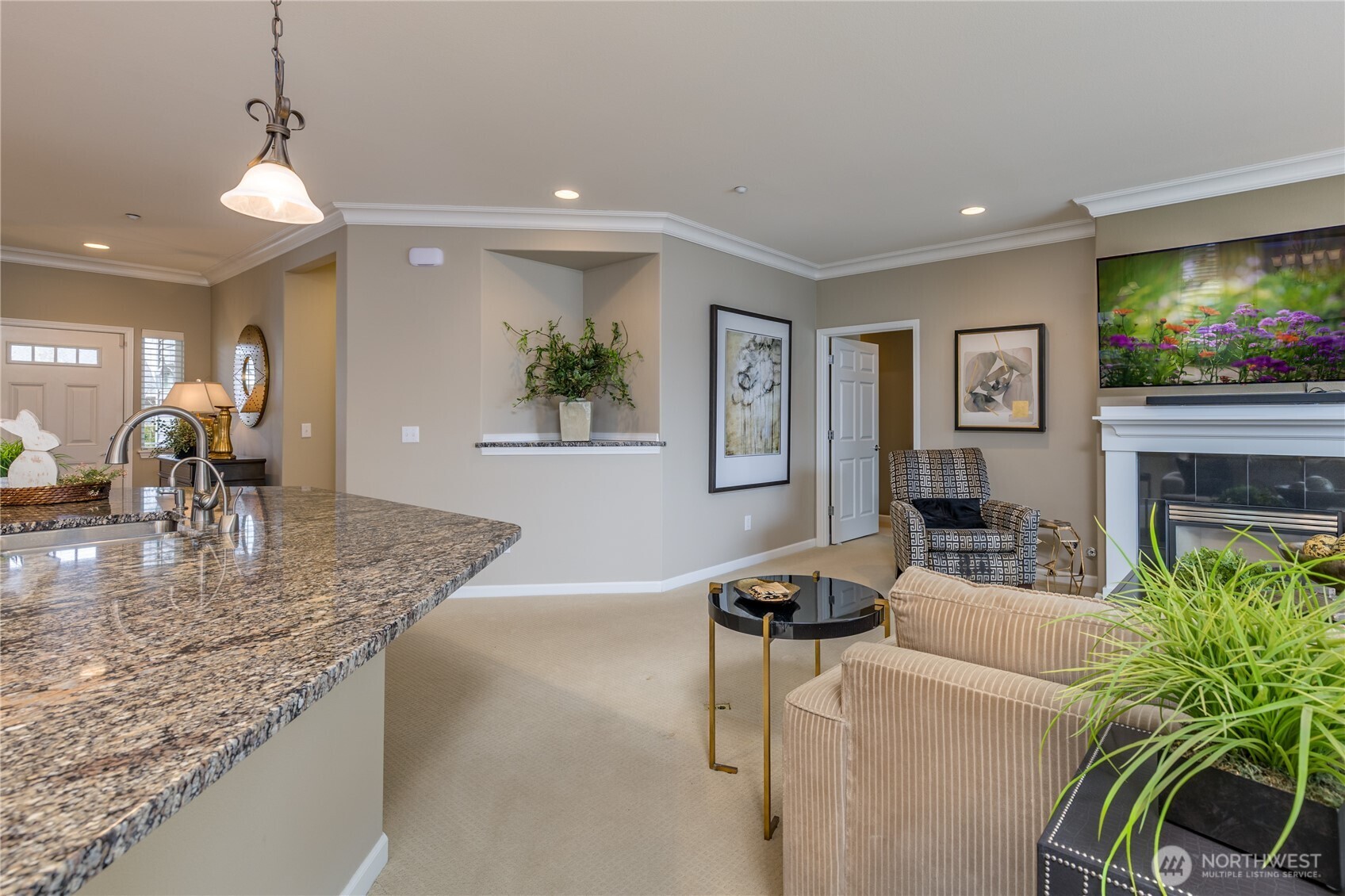 A charming architectural wall nook adds a touch of character and provides the perfect spot for displaying your favorite decor