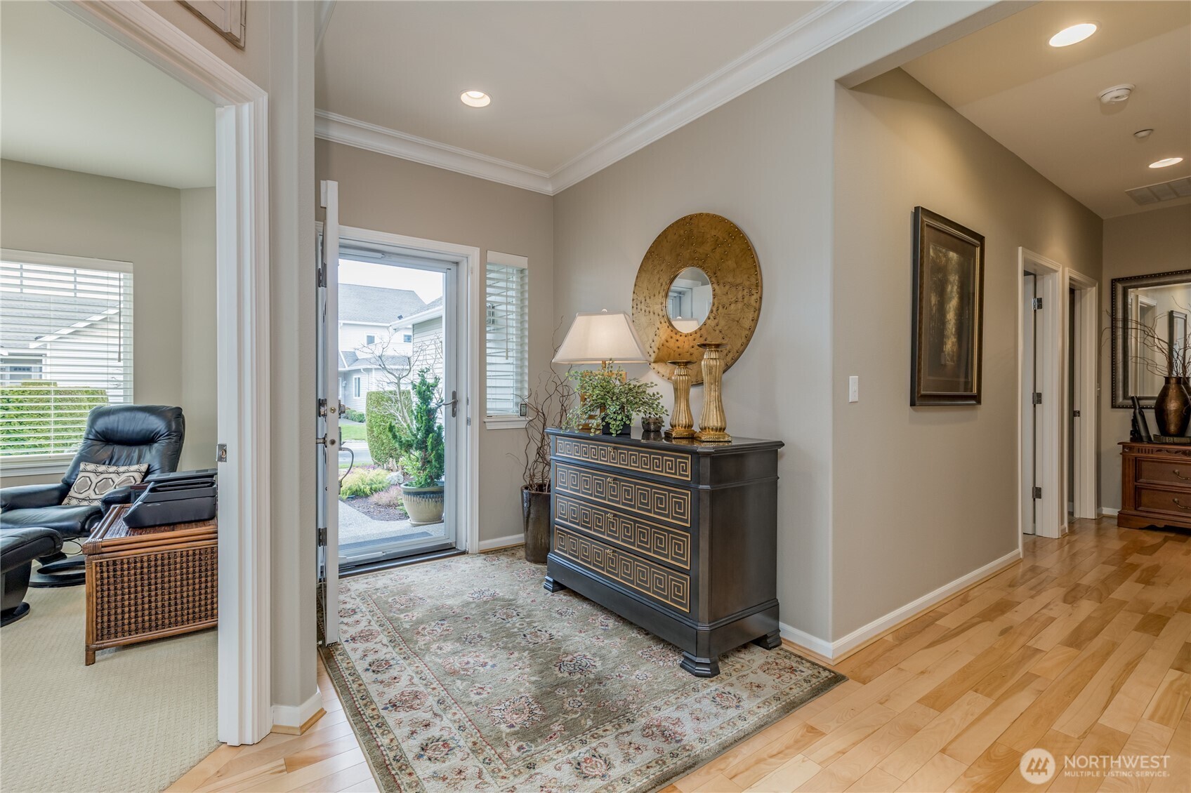 Great first impression! This inviting entry is flanked by a bright front office, ideal for guests or a quiet workspace.