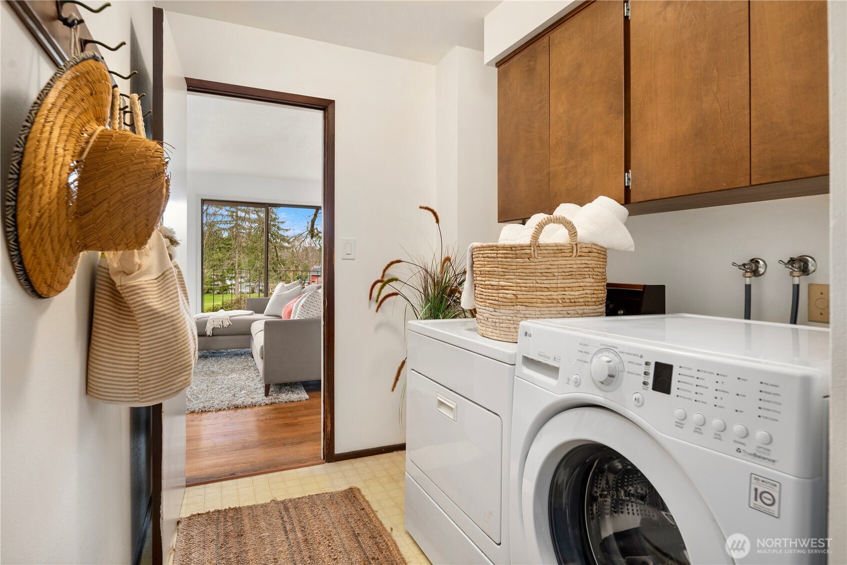 Laundry area tucked out of sight, just off the 2-car attached garage.