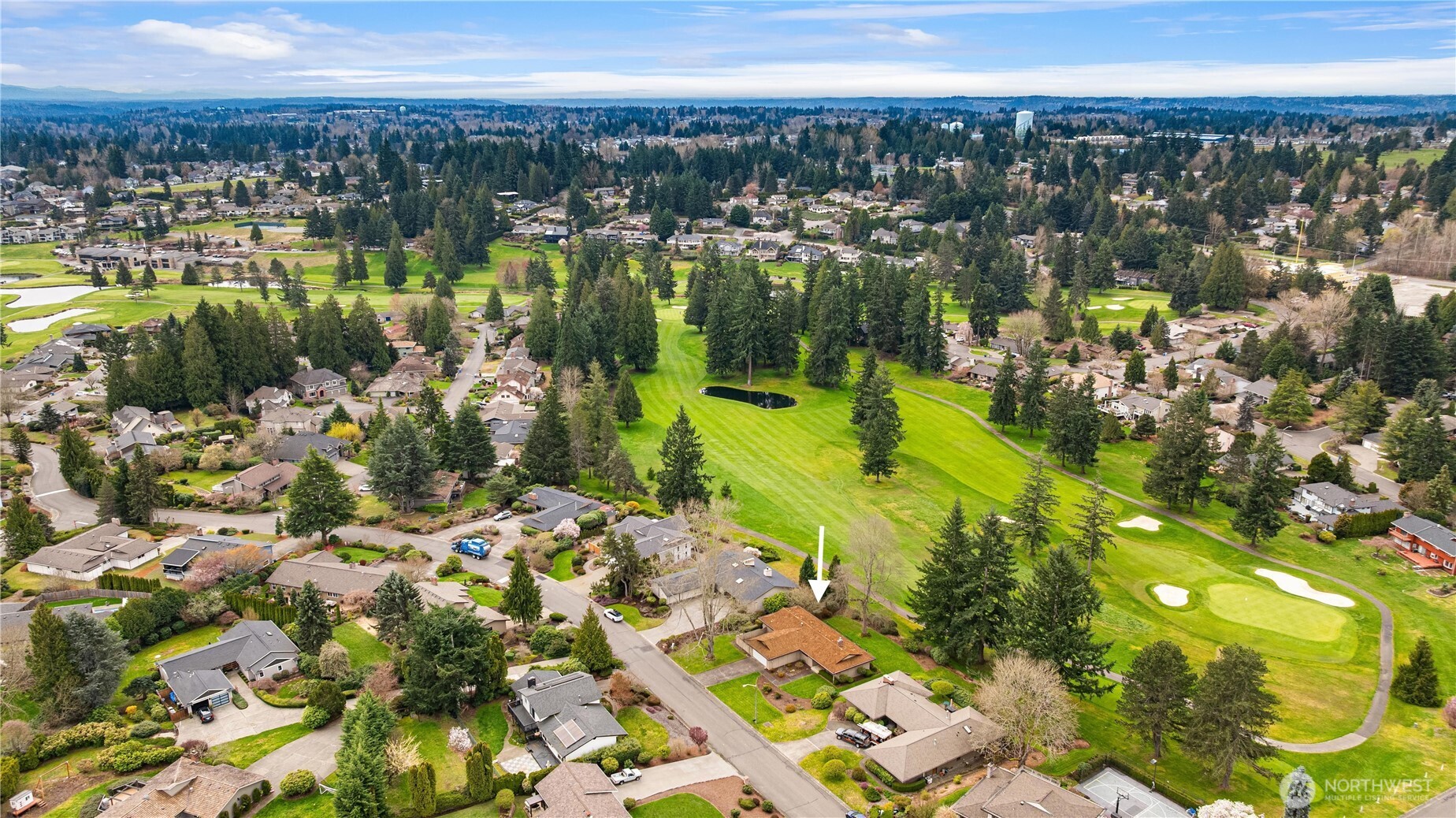 Meridian Valley Country Club, established in 1967, and we're told that this residence was the 4th house in the community.