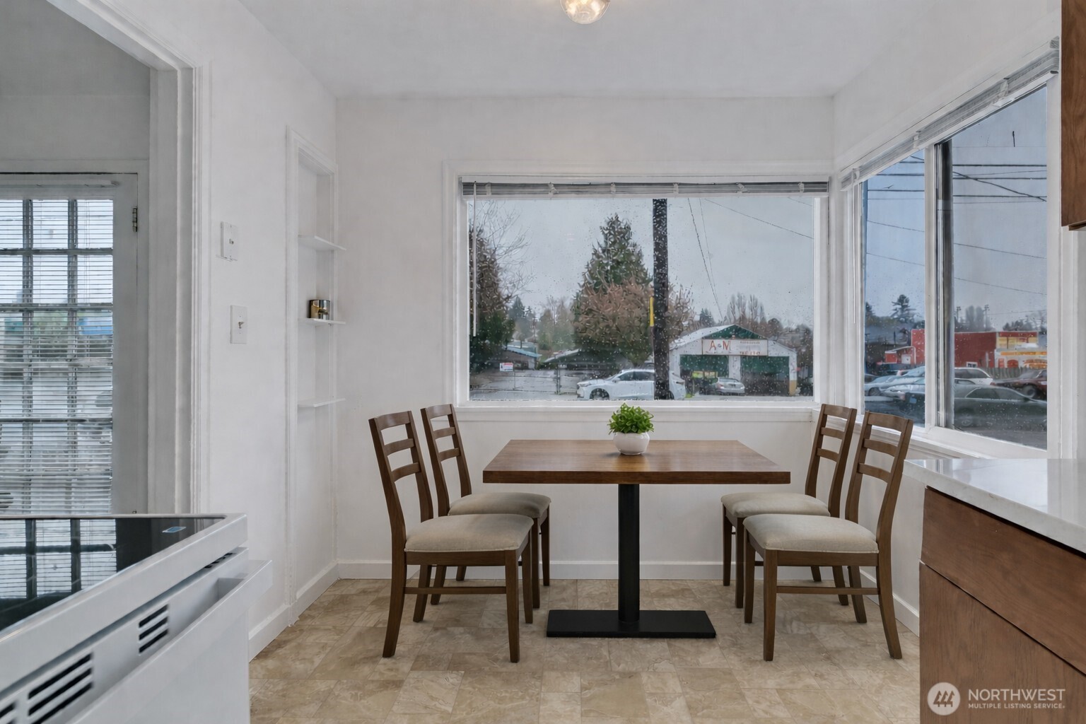 Virtual Staging of Eat-in kitchen table.