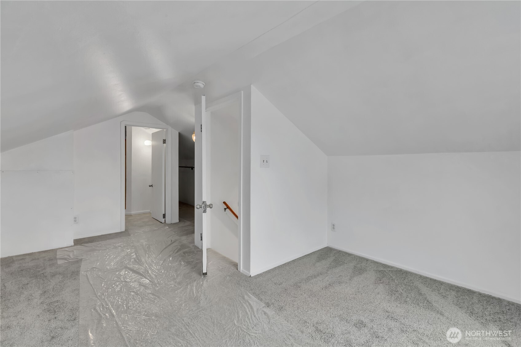 Upstairs primary bedroom with large closet and bathroom.