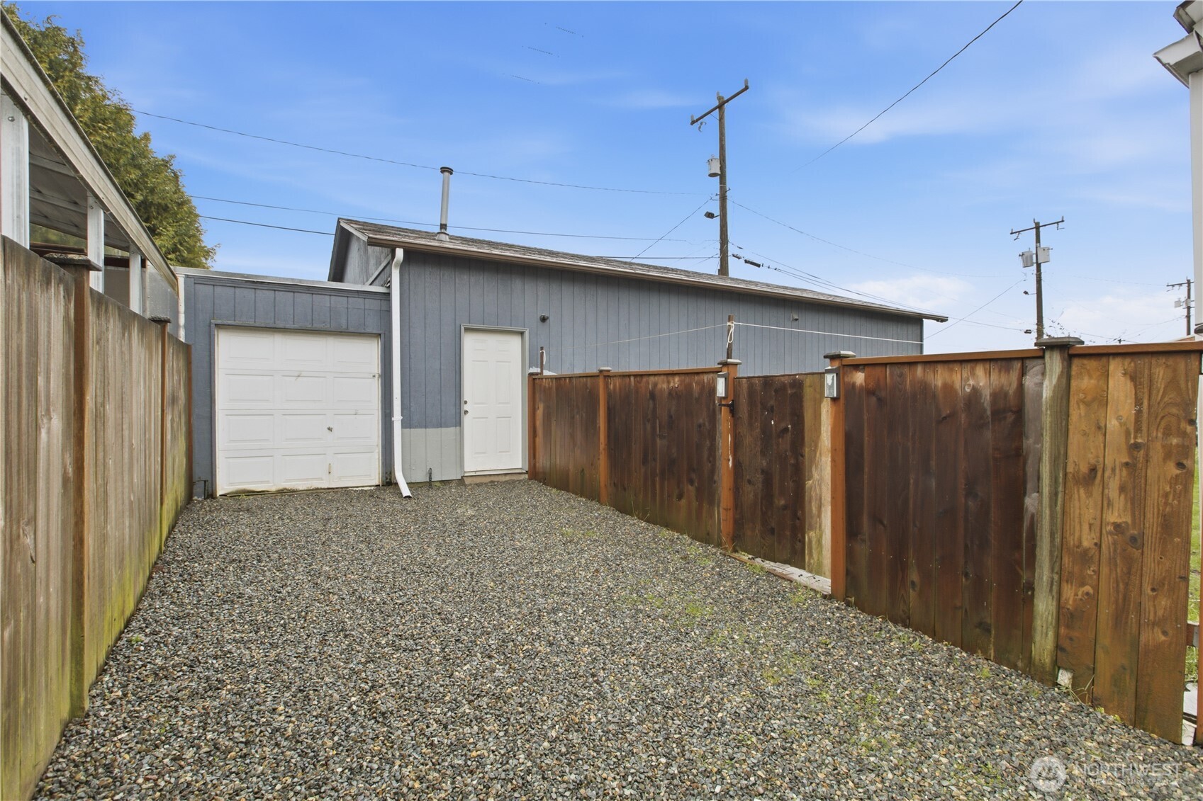 Garage access and driveway from the front of the home.