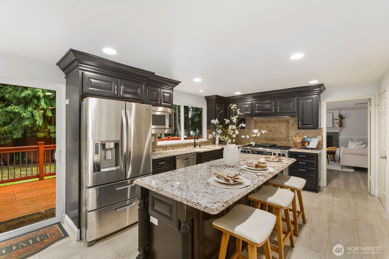 Kitchen with refinished cabinetry