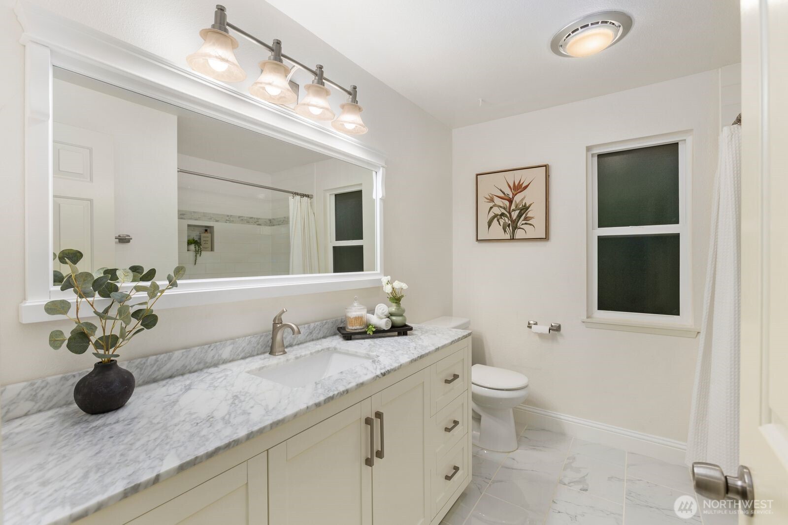 Guest bathroom with new tile and vanity