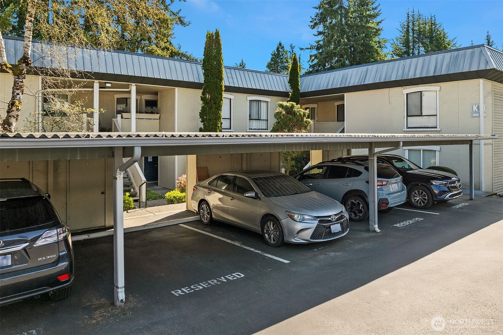 Dedicated covered parking space with large storage unit. Ample guest/additional parking!