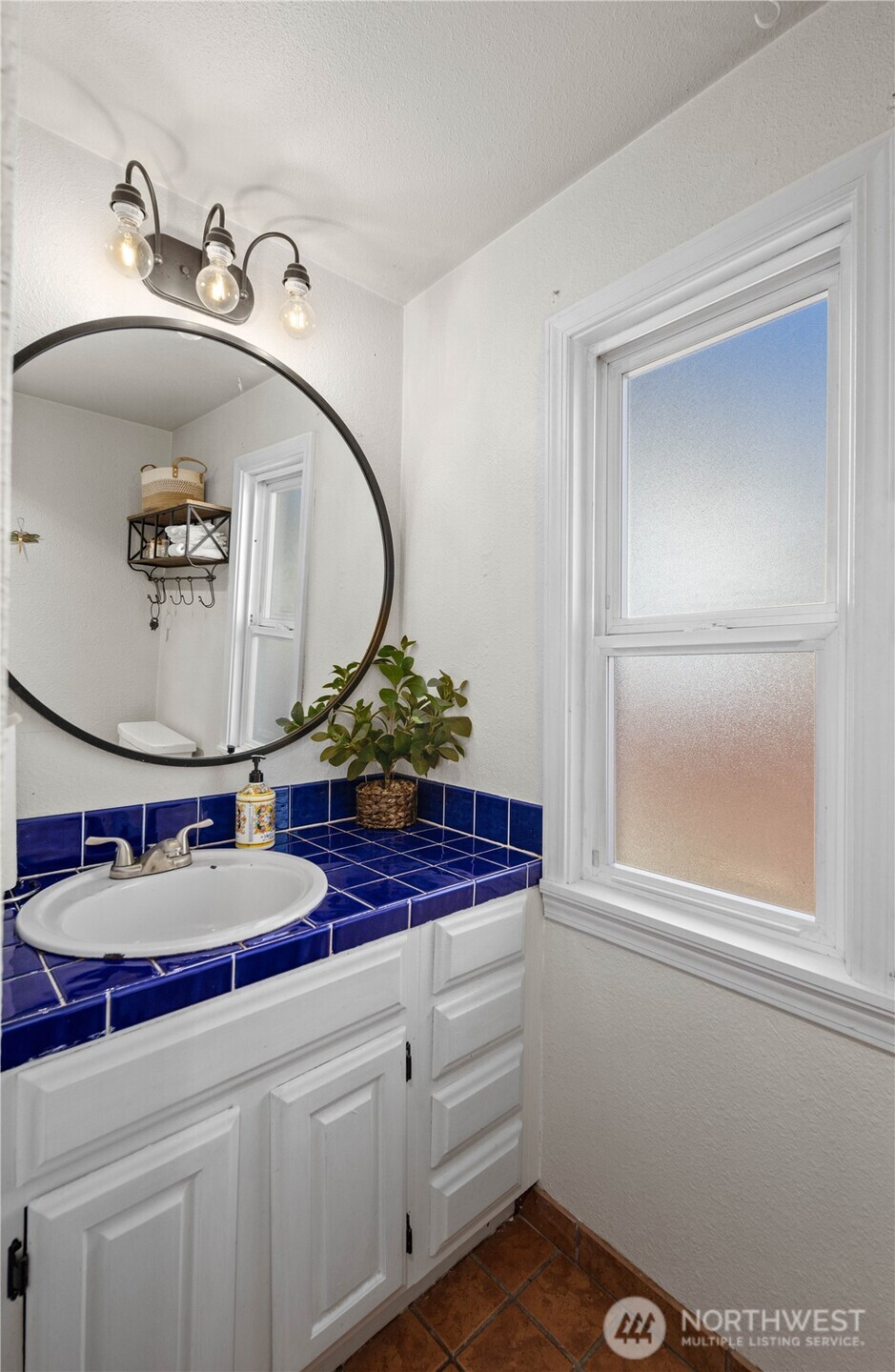 New, contemporary mirror and light fixture