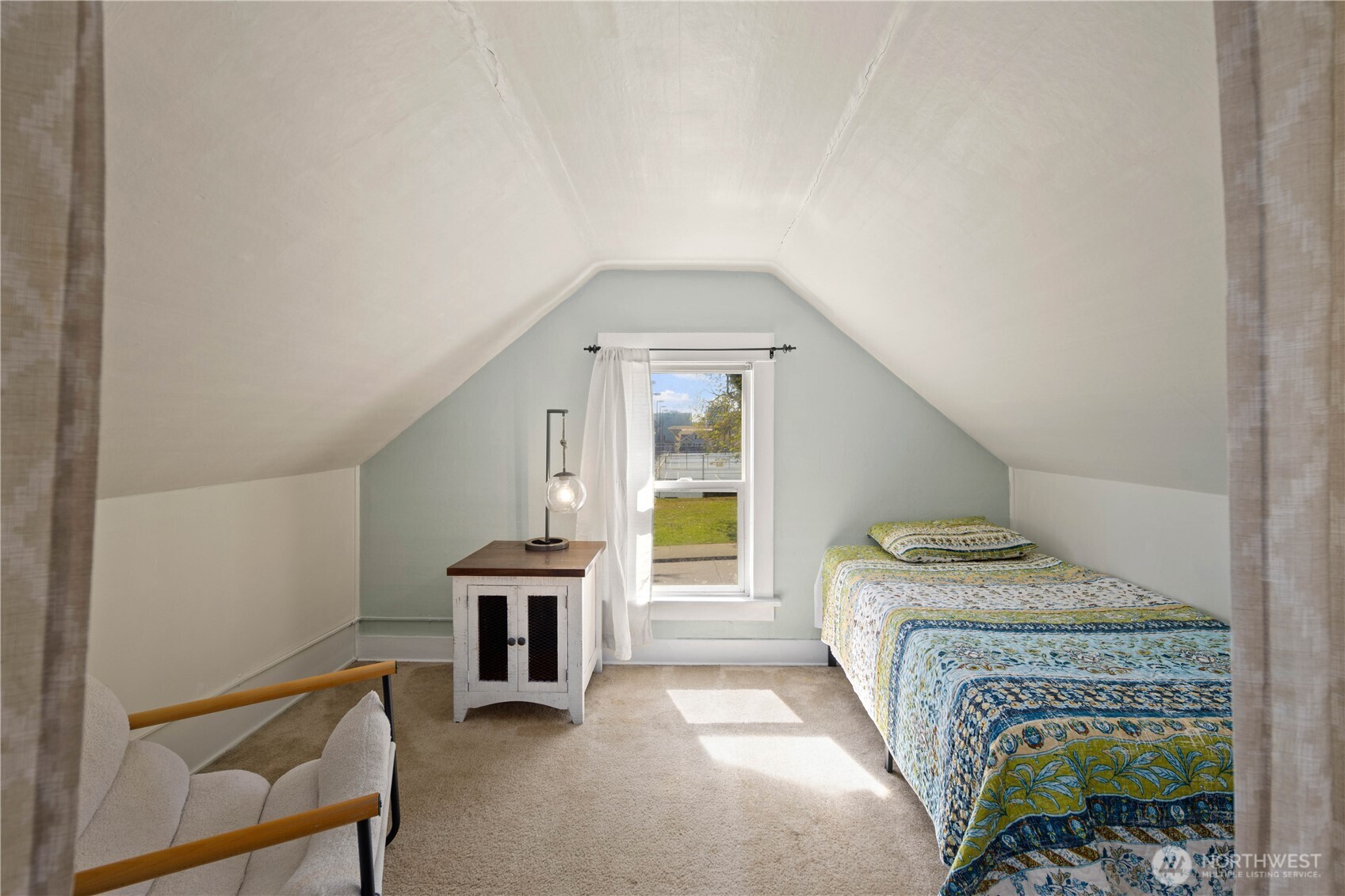 Current sleeping area, south facing window assures gentle morning light