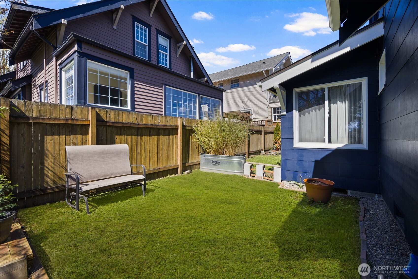 Verdant lawn in the sun drenched side yard