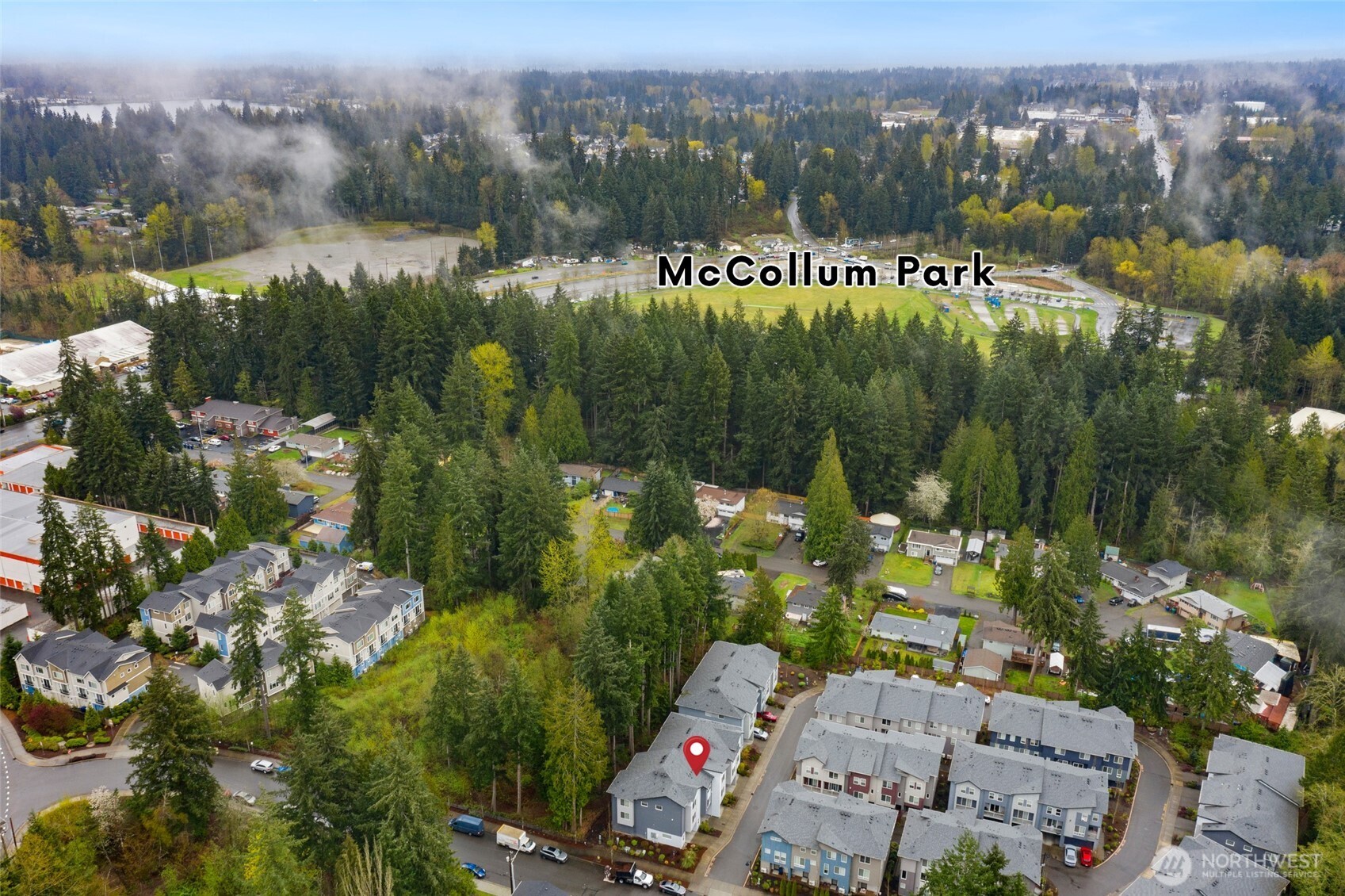 Property backs to greenery and offers trails to McCollum Park.