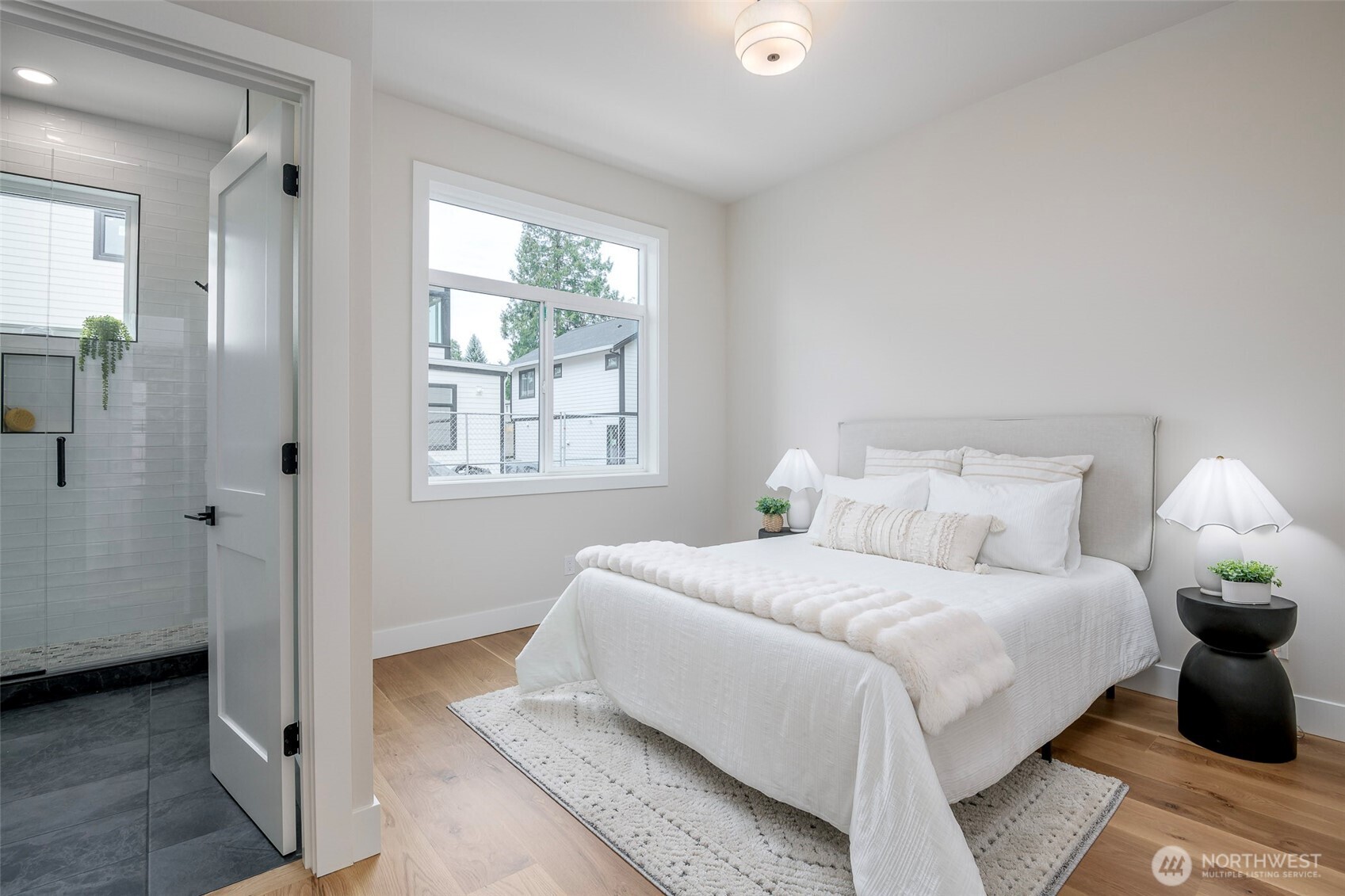 Walk-in shower in the En-Suite on the main floor styled with beautiful tile.