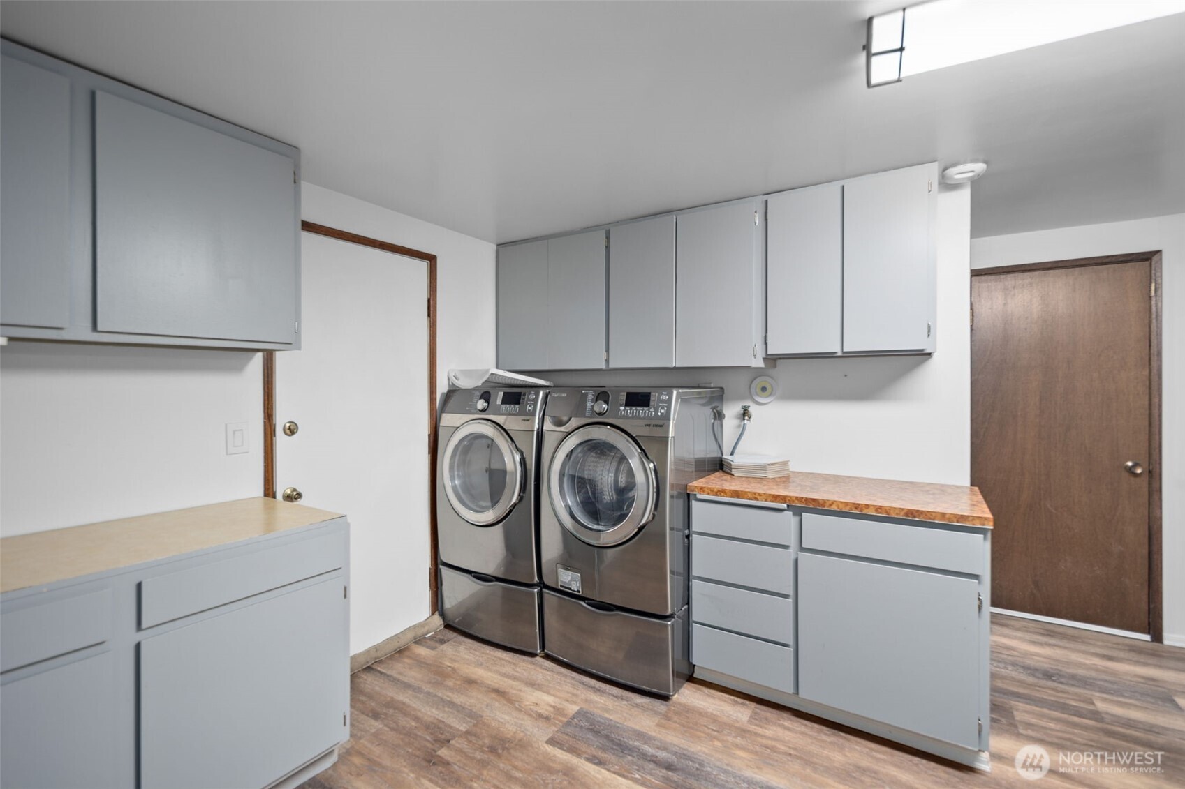 Newer washer and dryer complete the downstairs.
