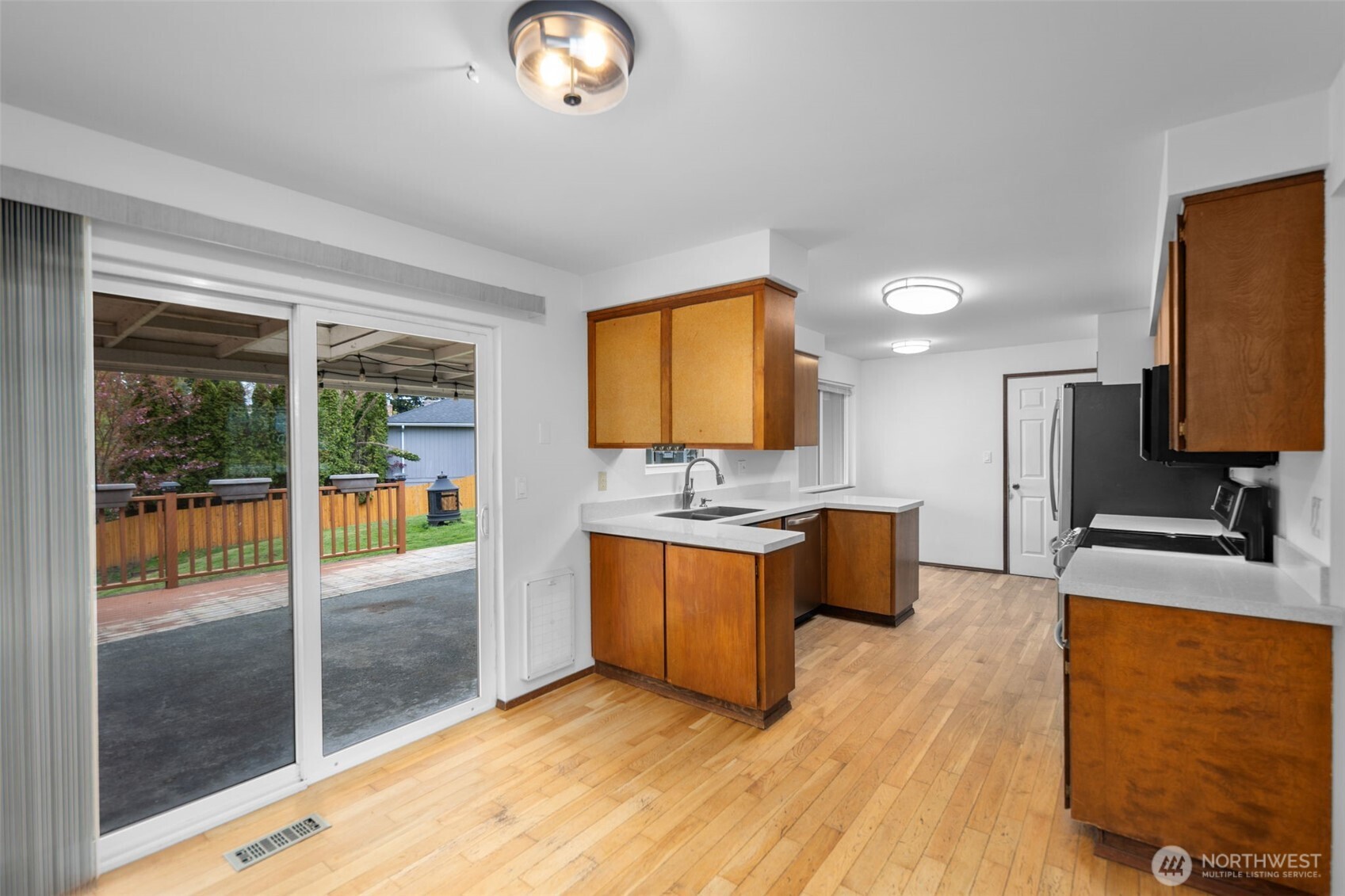 Through to the dining room which leads to the kitchen or backyard.
