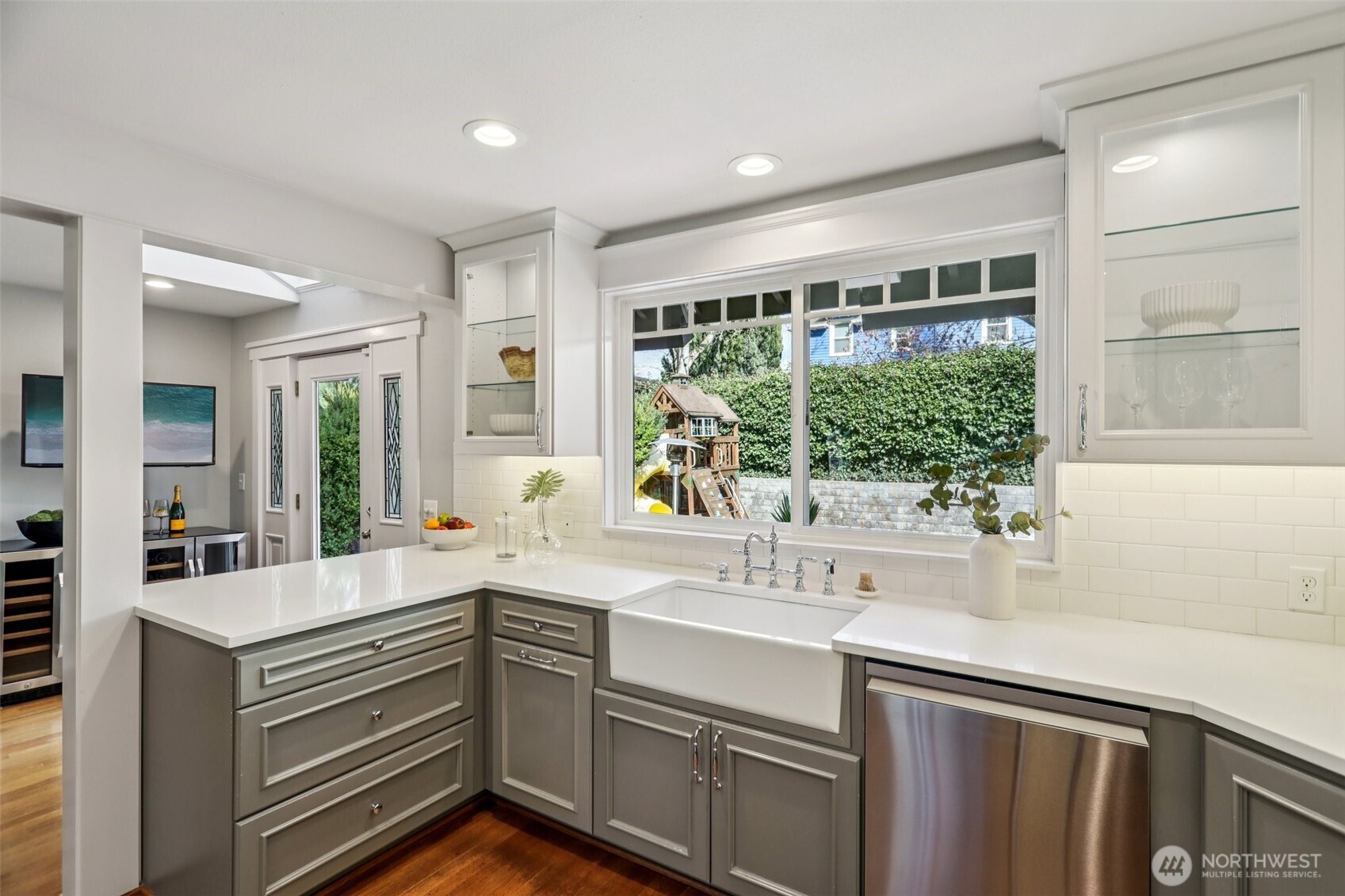 kitchen walks out to a level, low maintenance, and private yard!