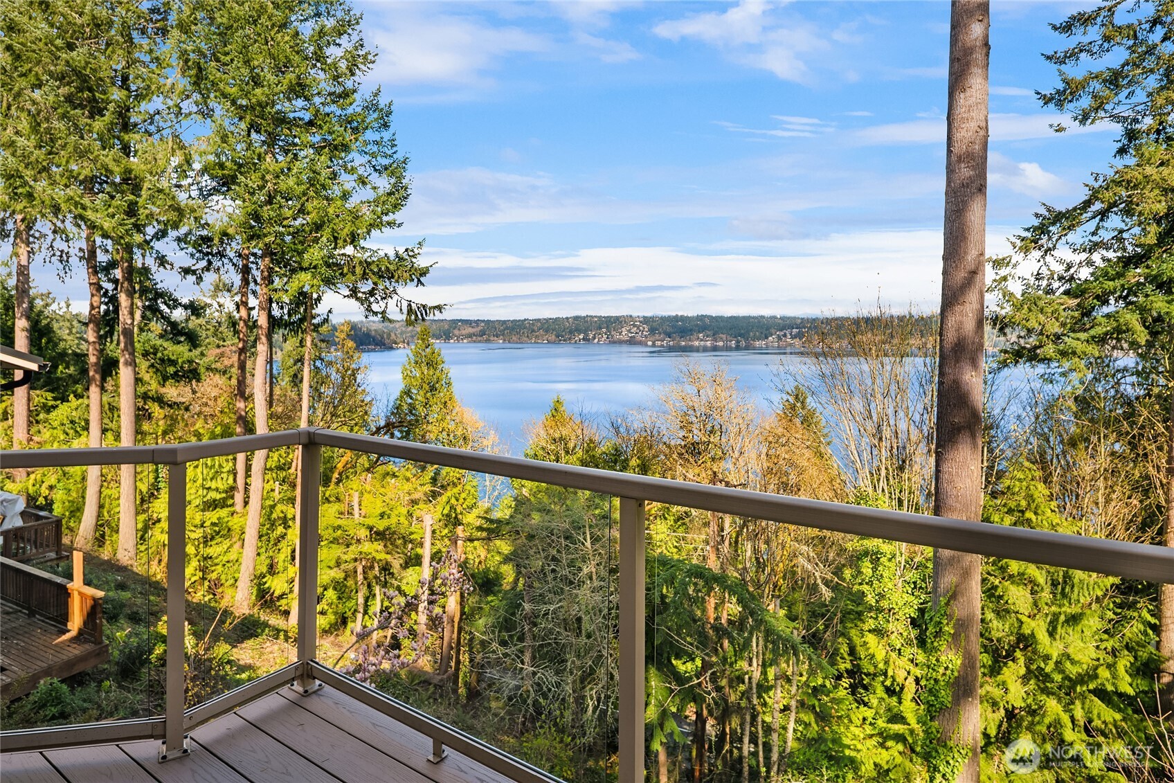 A backdrop of evergreens and water bring calm to daily life.