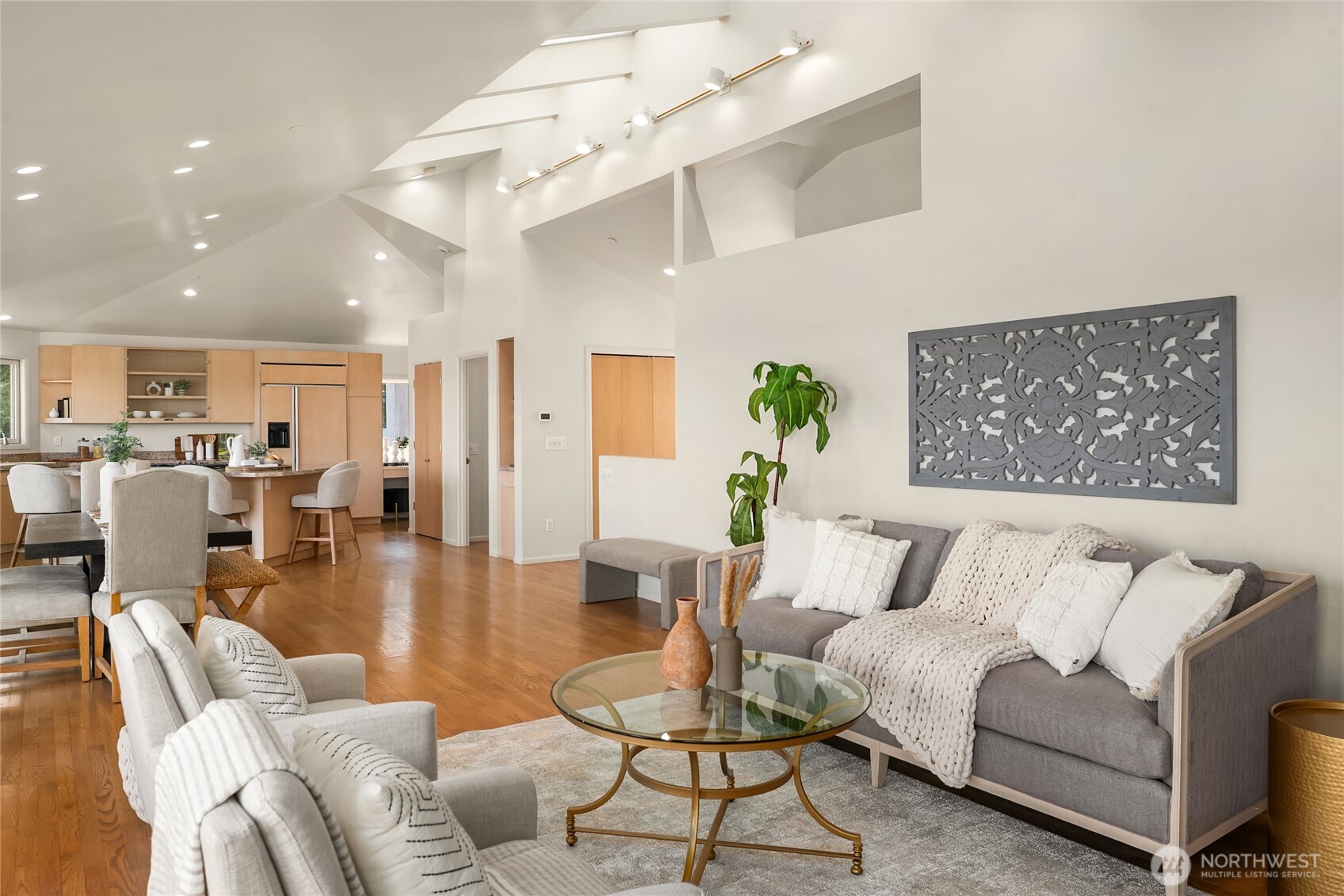 Vaulted ceilings, skylights, and open sight lines create an effortless flow.
