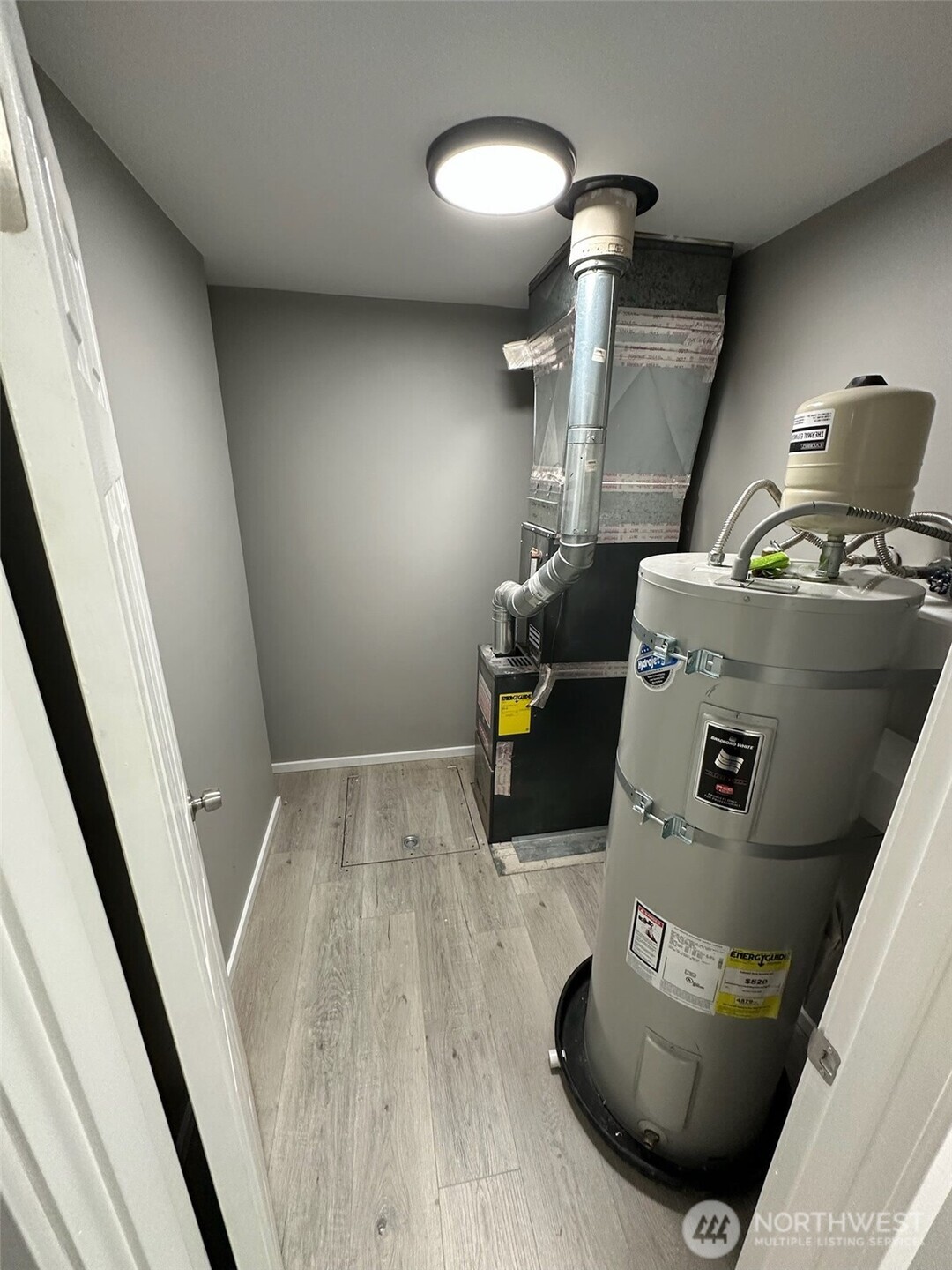 Utility room with water heater and furnace