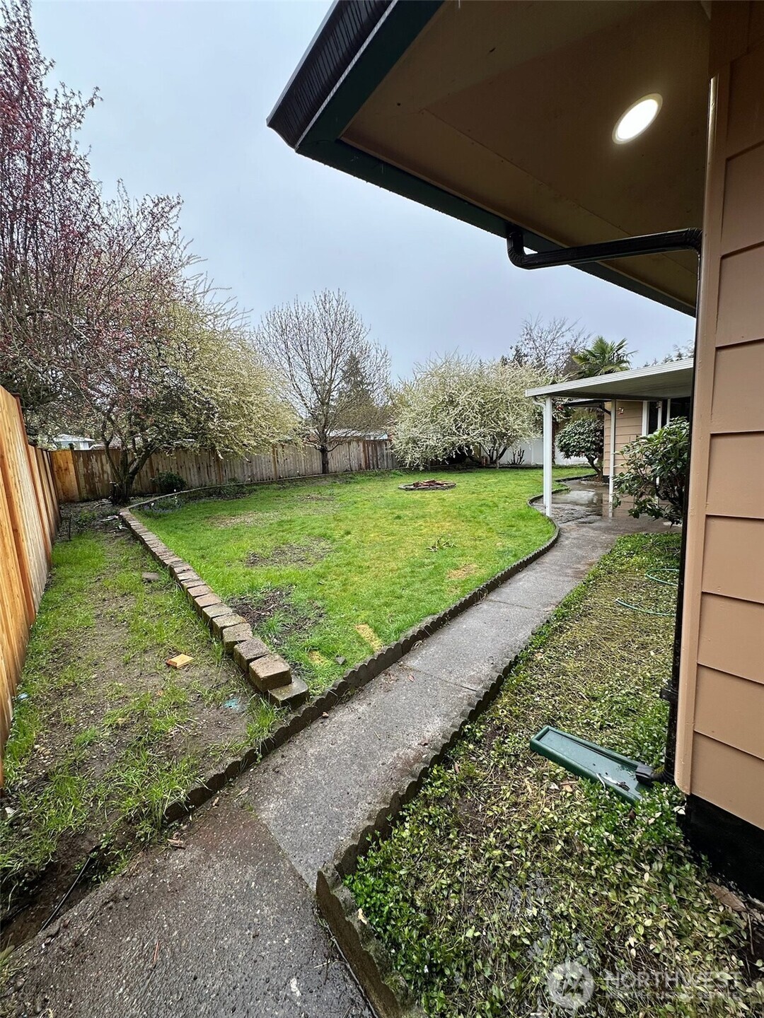 Looking at backyard after going through side gate