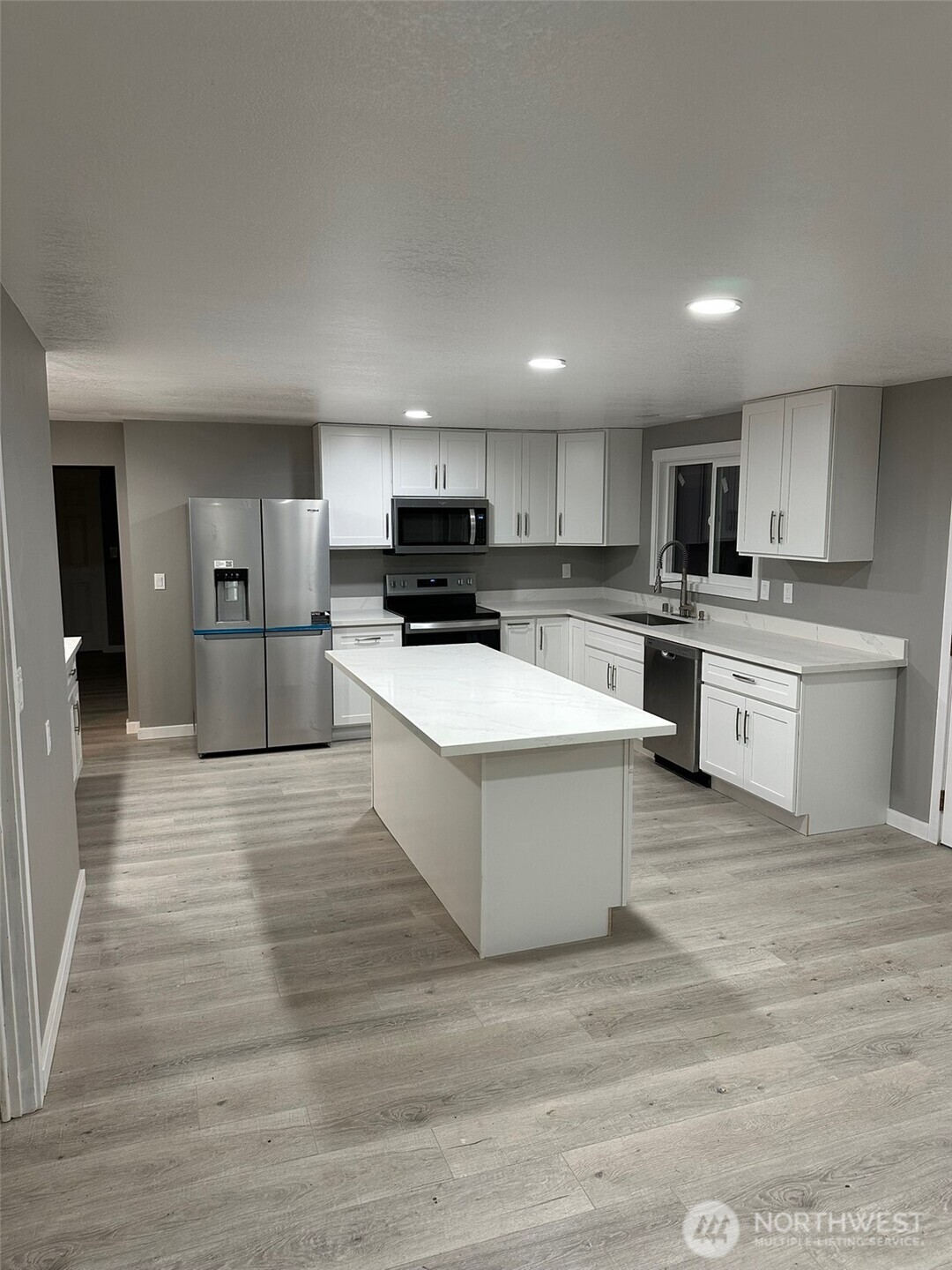 Large, spacious kitchen with island and brand new appliances