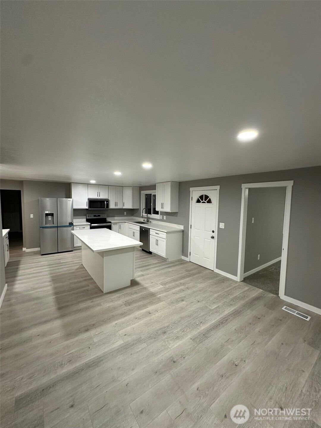 Back door and doorway to bonus room