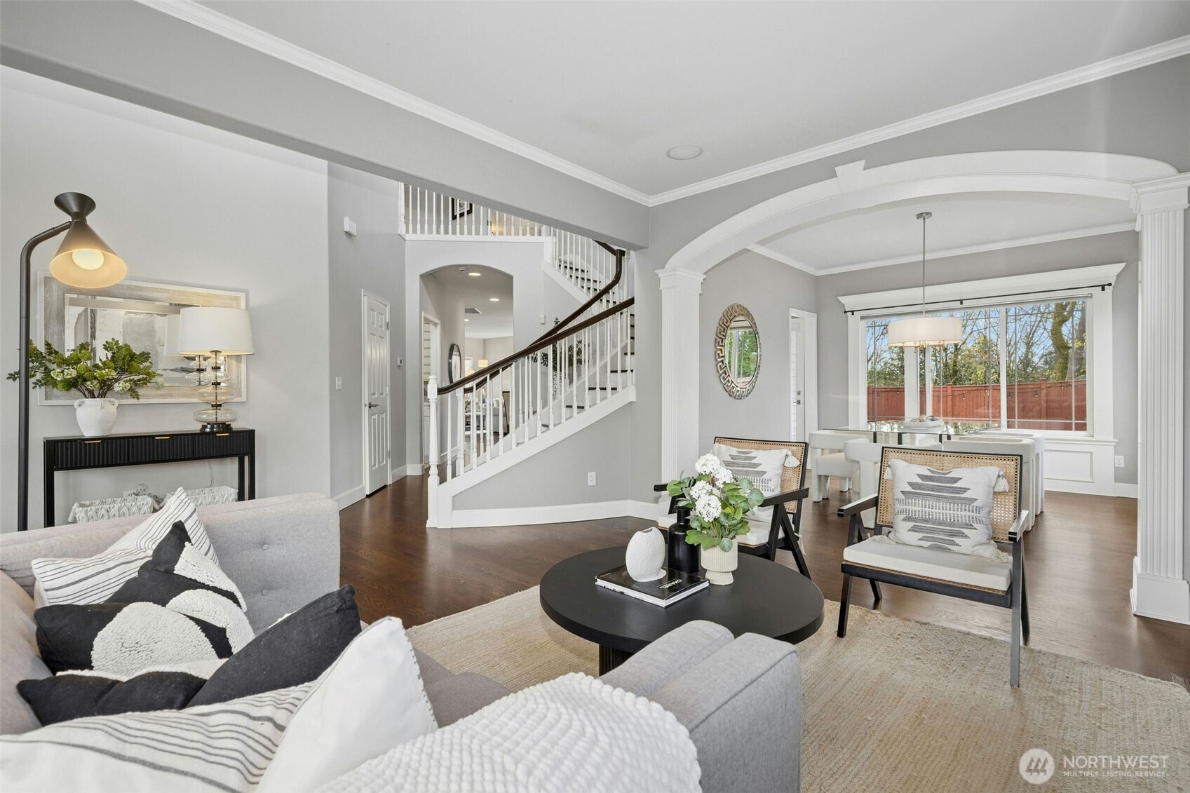 A lovely living area anchored by clean lines and natural light.