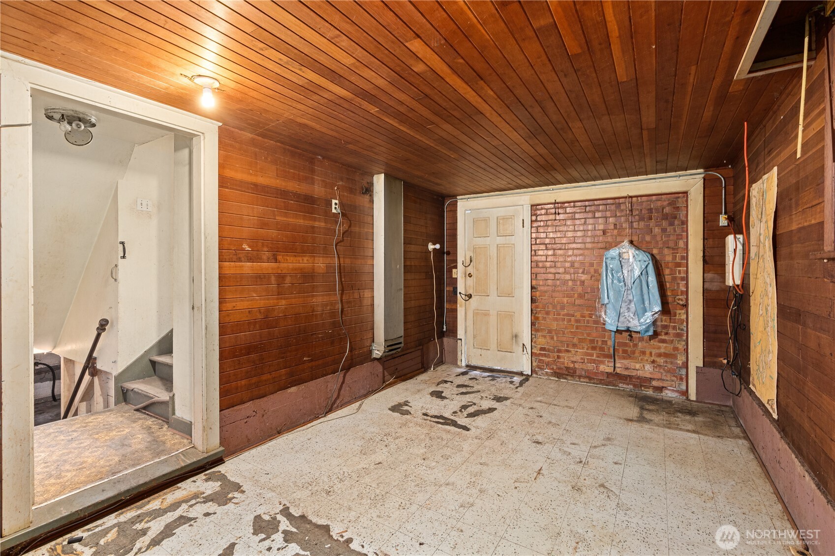 Attached garage has been partially finished into living space.