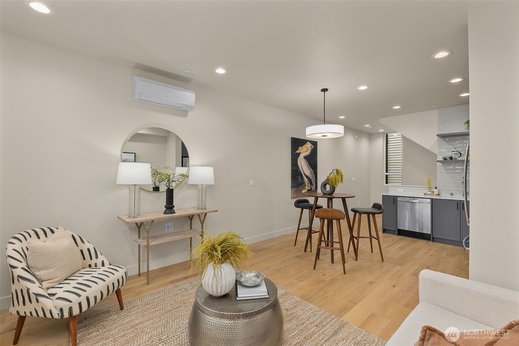 Living, dining, and kitchen areas flow seamlessly, perfect for relaxing evenings or weekend hosting.