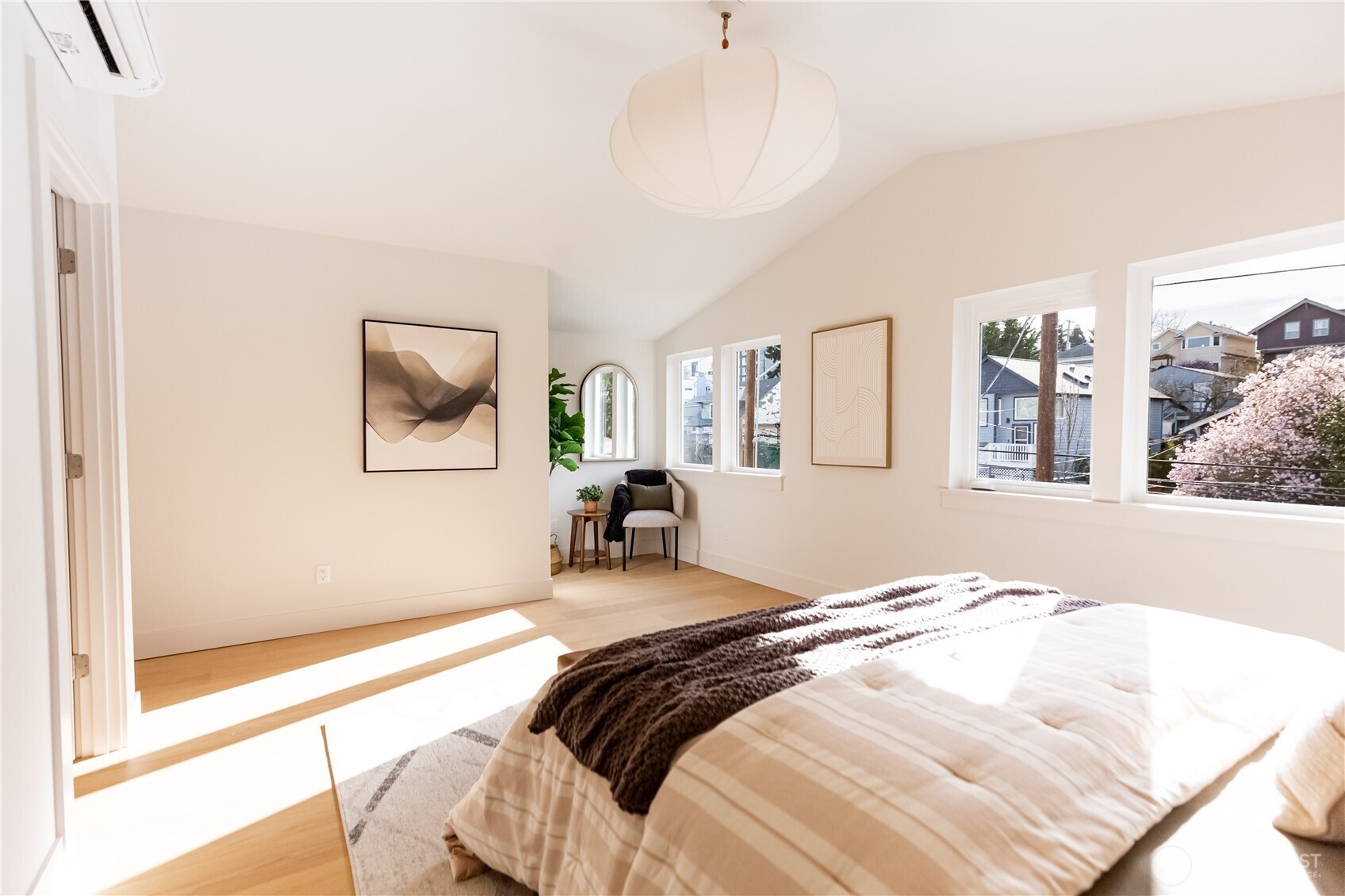 The primary suite feature a handy nook area for bench seating or dresser