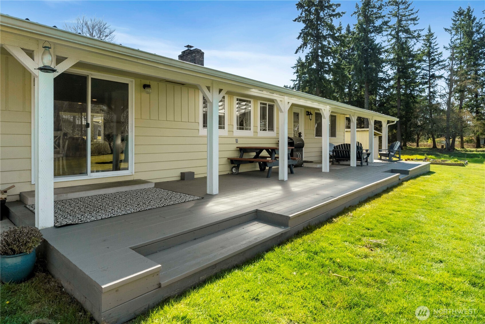 Covered back porch perfect for entertaining