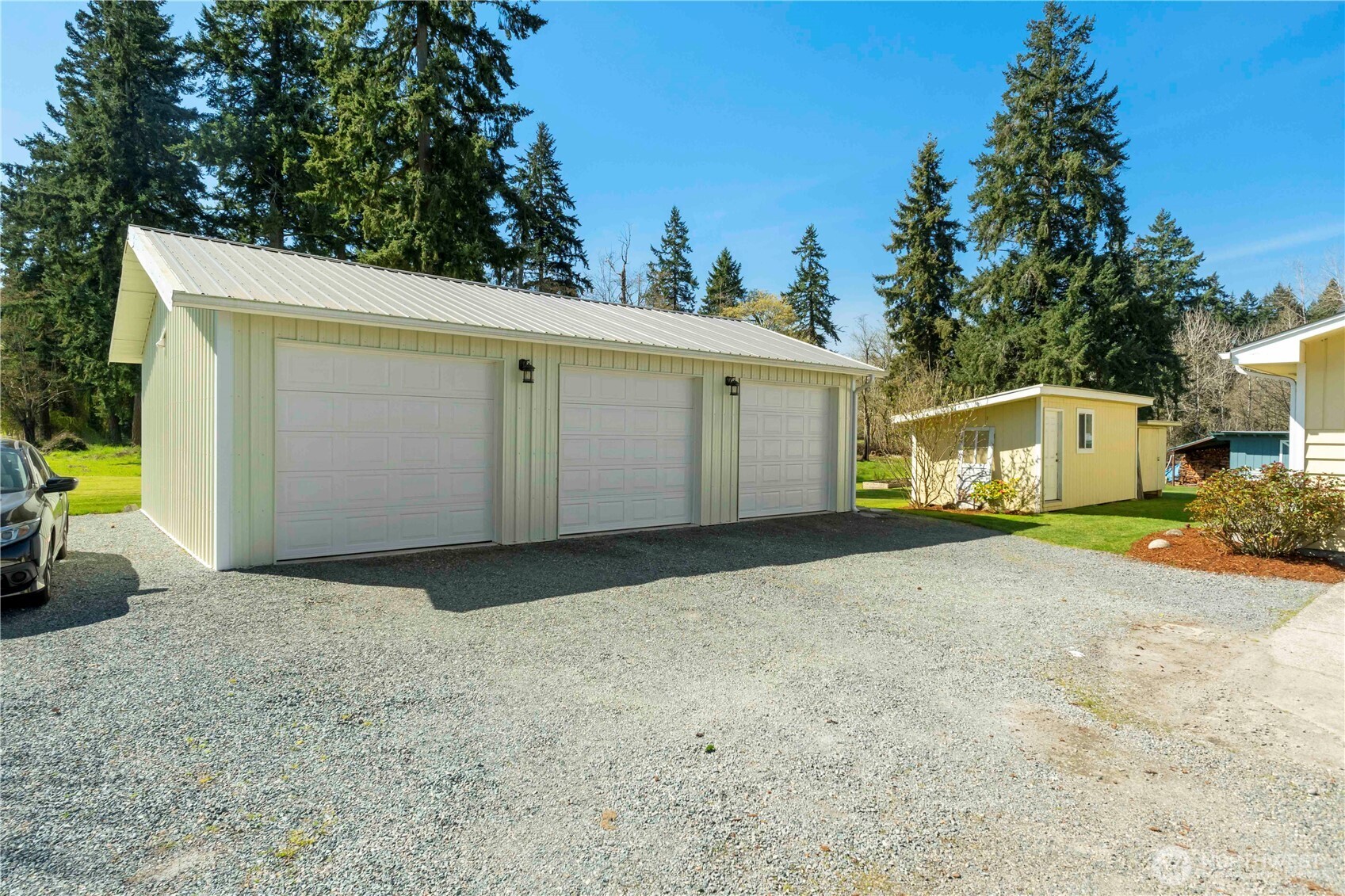 Fairly new 3 car shop with electric garage door openers