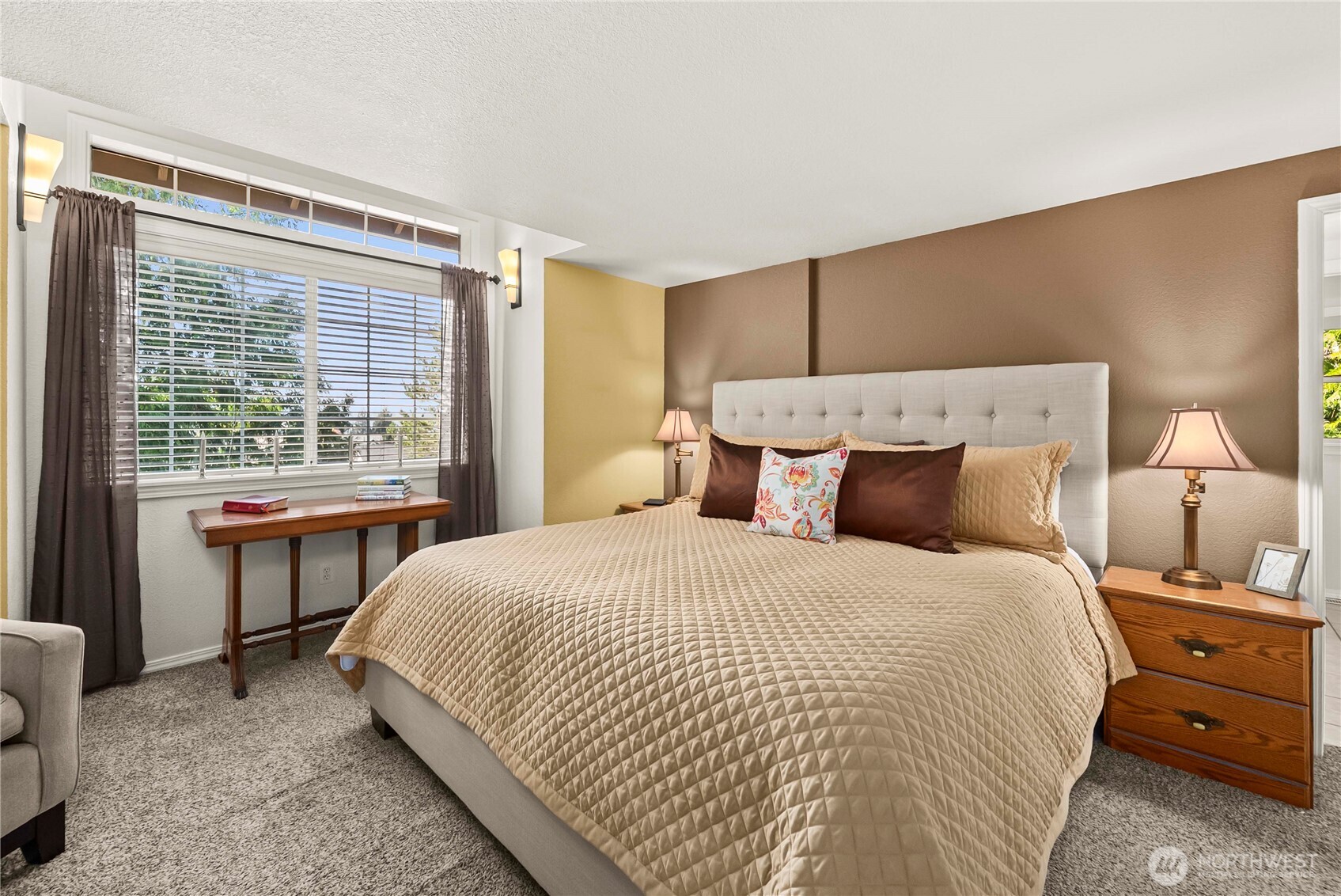 The family room has plenty of room for the entertainment center and all the seating.