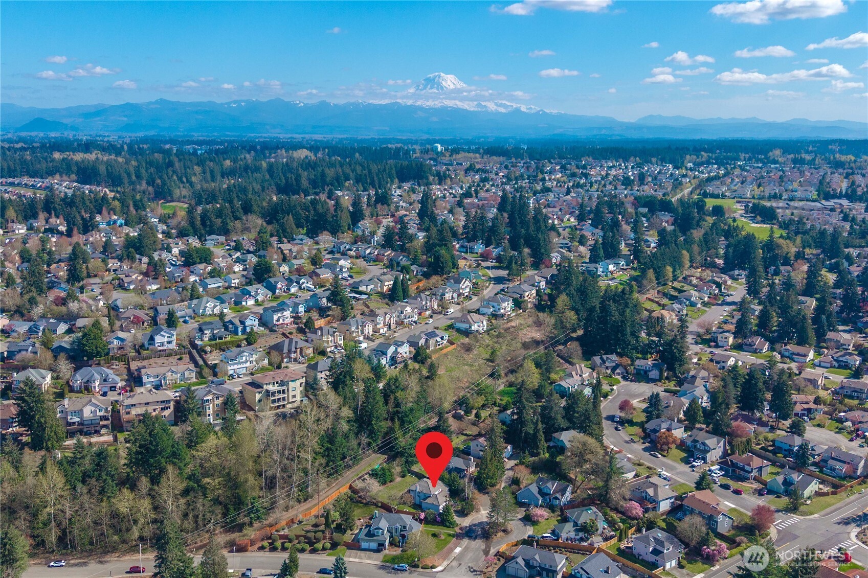 The property backs up to a neighborhood walking trail and greenspace