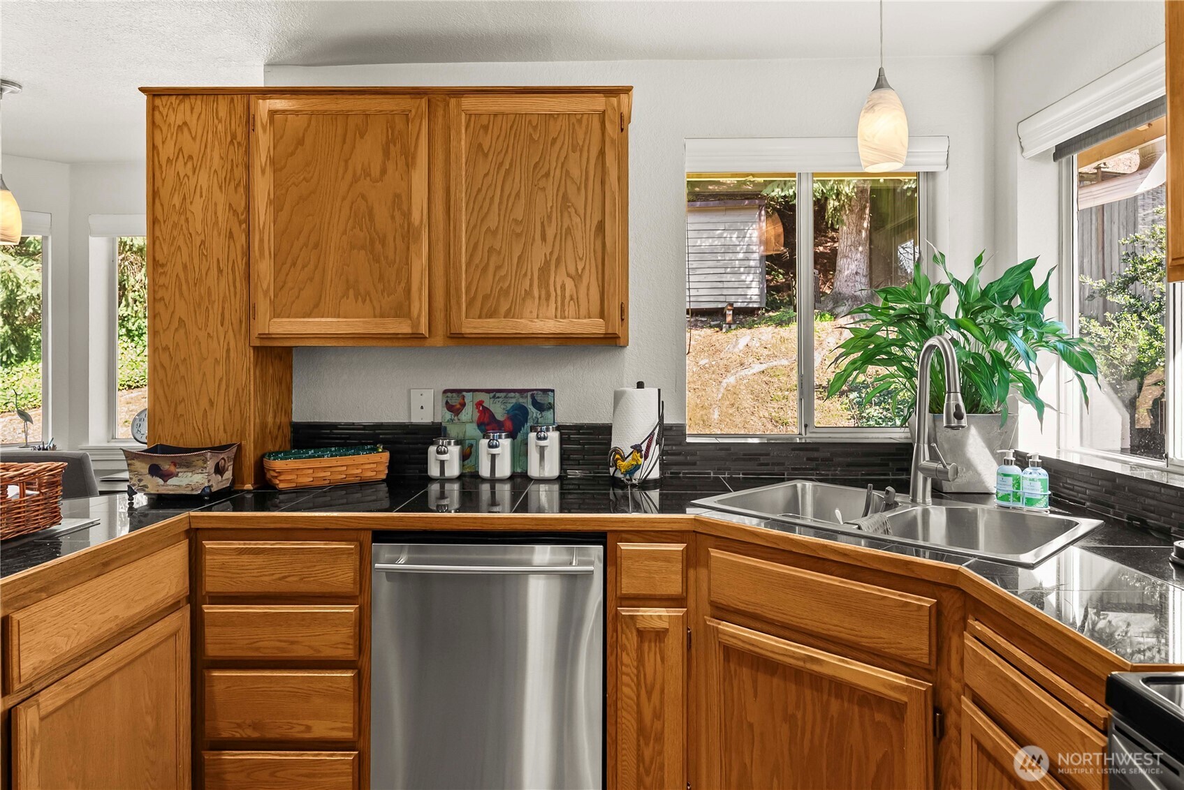 Dining room is conveniently located between the kitchen and formal living room for ease of entertaining